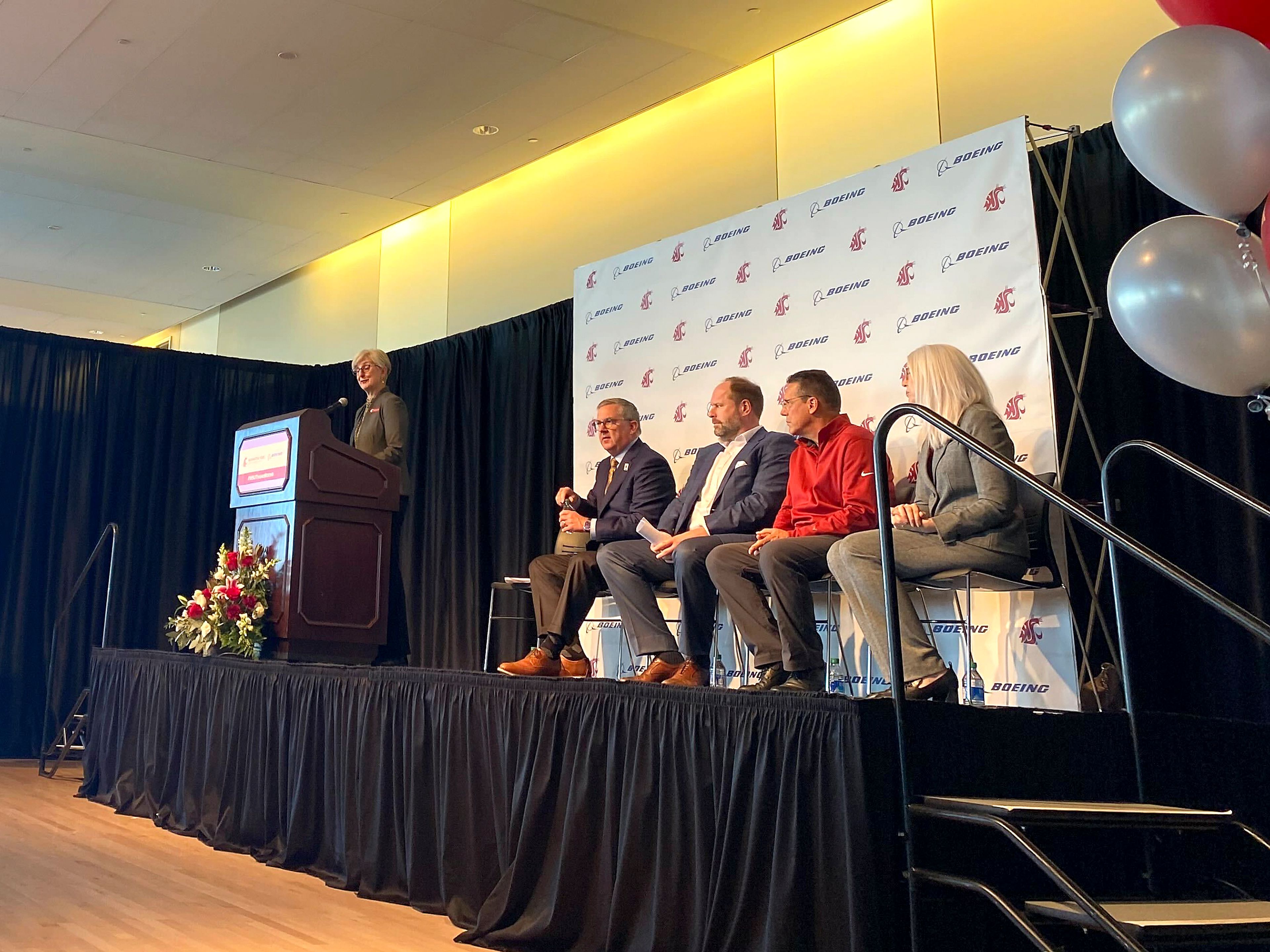 Elizabeth Chilton, (from left), WSU provost; Kirk Schulz, WSU president; Bill McSherry, Boeing vice president of State and Local Government Operations; Craig Bomben, Boeing Vice president of Flight Operations and Chief Test Pilot; and Mary Rezac, WSU dean of Voiland College of Engineering and architecture are pictured during an announcement of a donation to Washington State University from The Boeing Company in Pullman on Thursday.