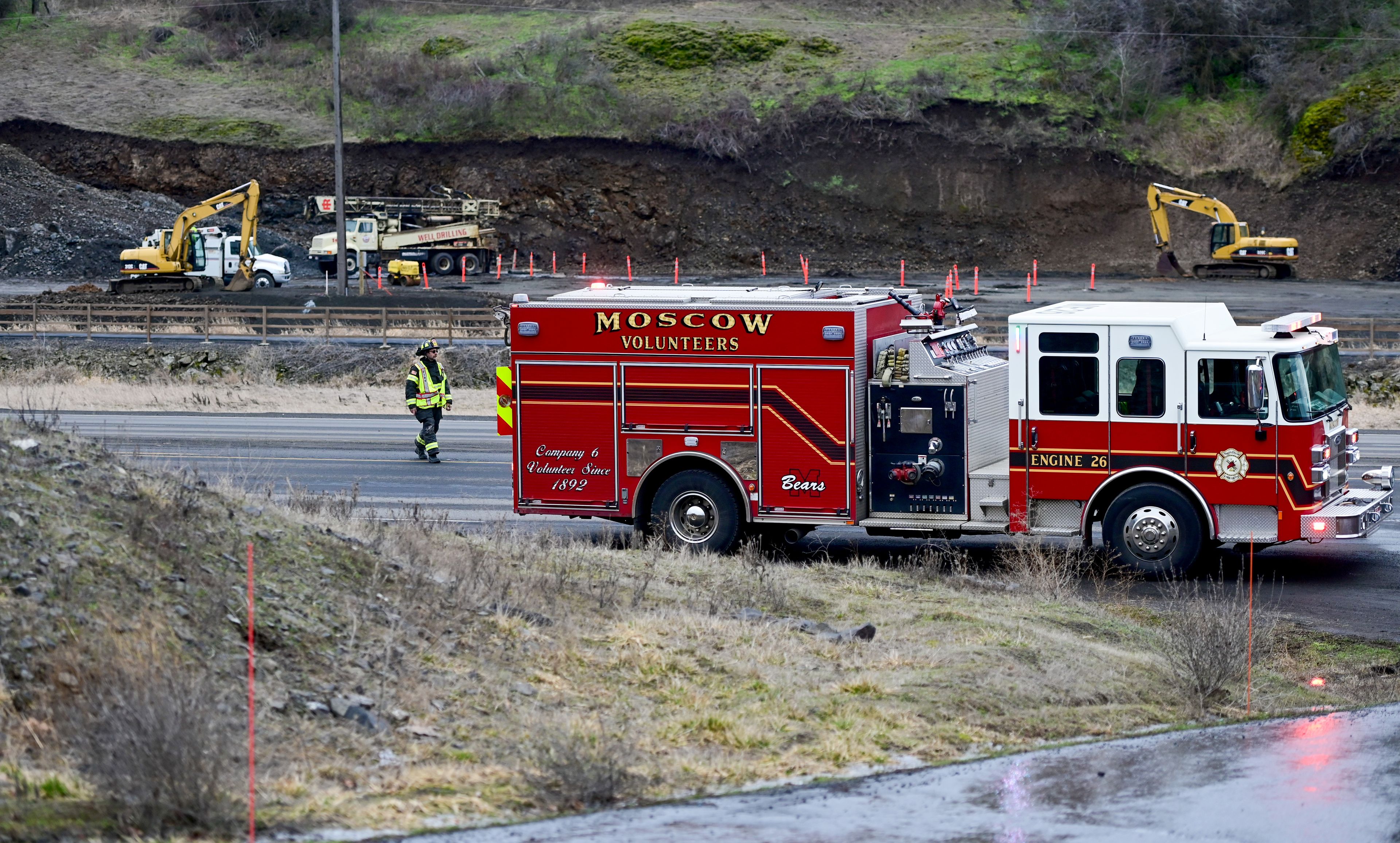 Drivers were directed around a closed lane of the Moscow-Pullman Highway as fire crews continued their work on a large fire at Express Storage on Thursday.