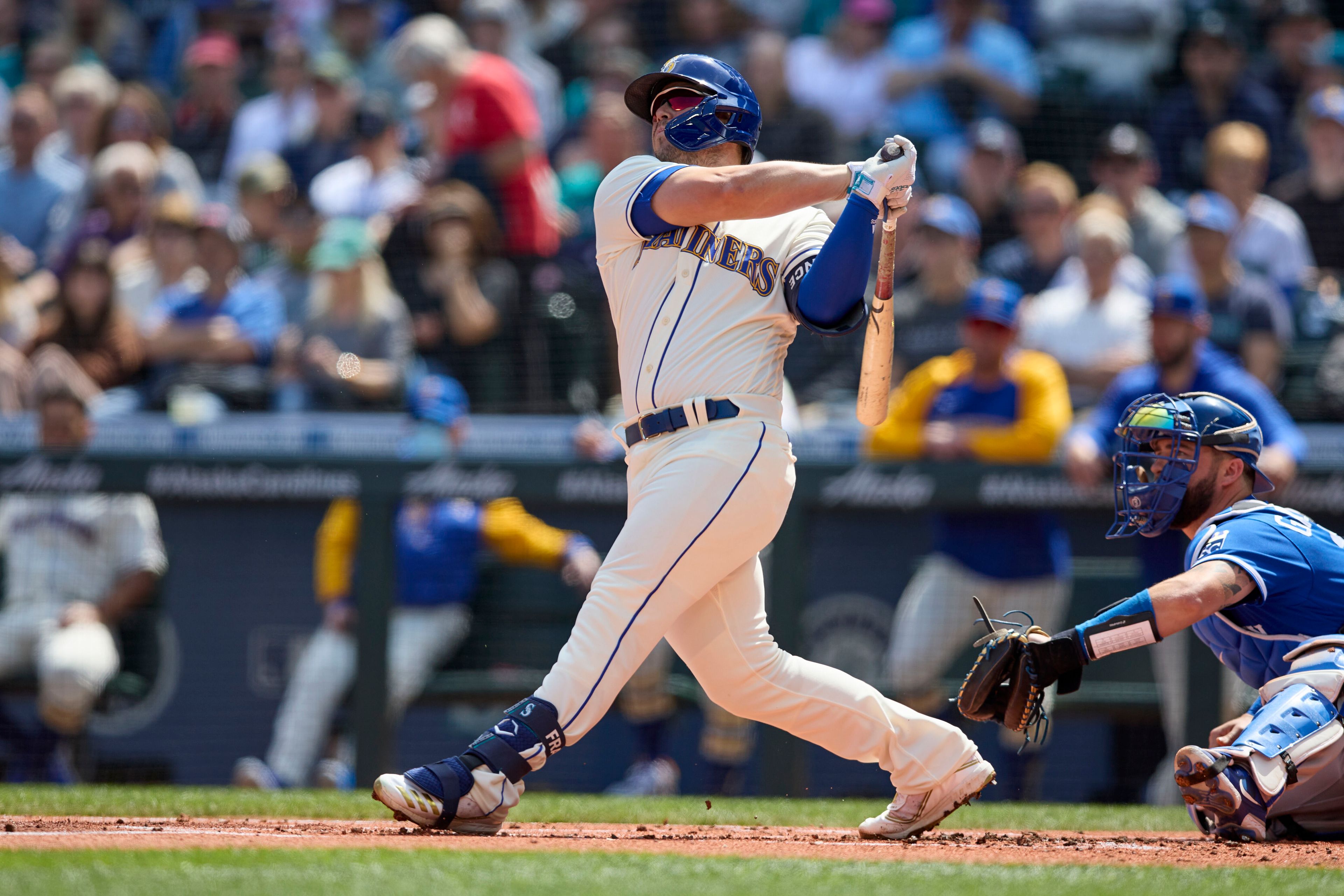 Seattle Mariners' Ty France hits a two-run home run on a pitch from Kansas City Royals starter Carlos Hernandez during the first inning of a baseball game, Sunday in Seattle.