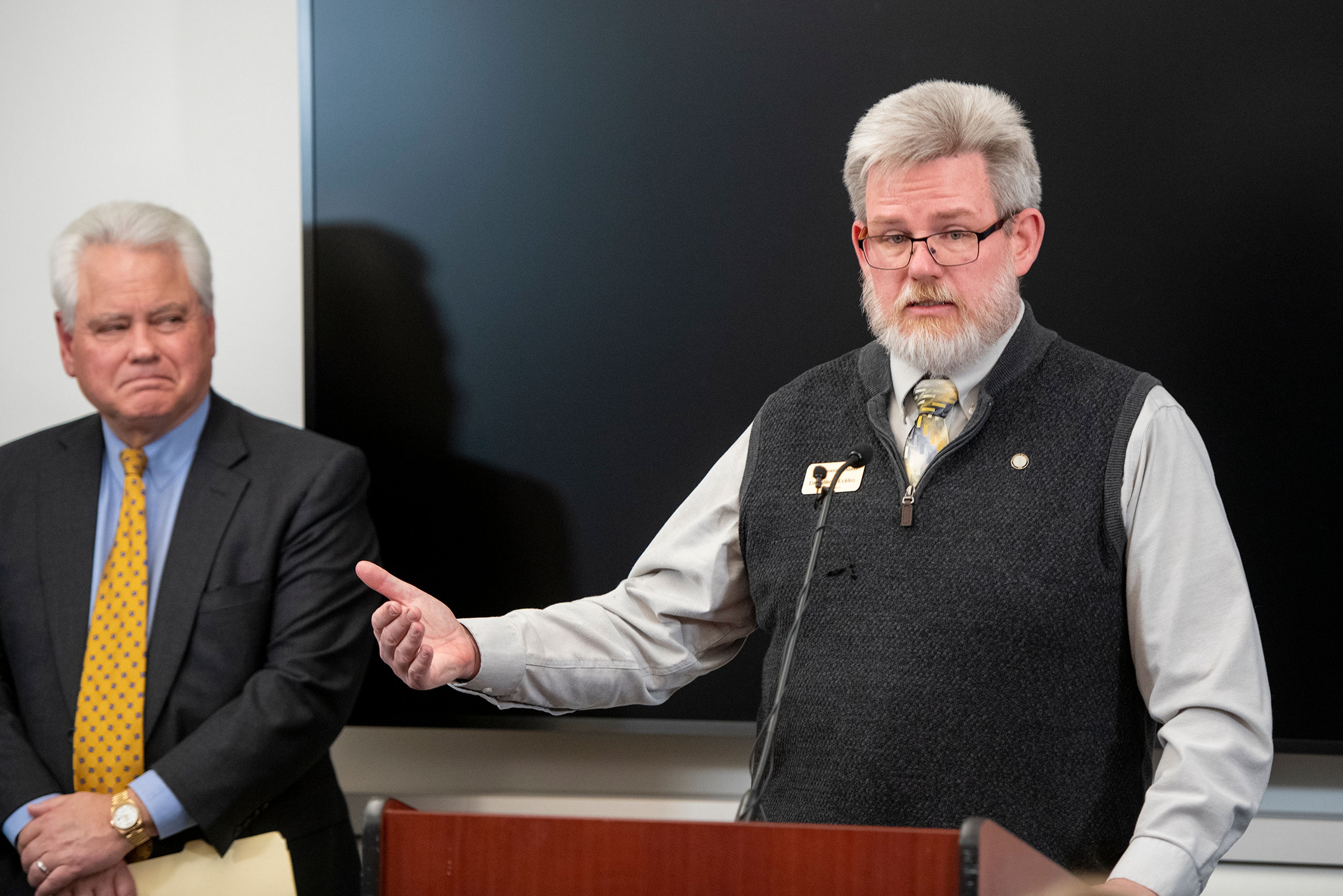 Dean of Students Blaine Eckles, right, answers questions during a press conference about a quadruple homicide investigation involving four University of Idaho students at the Moscow Police Department on Wednesday.