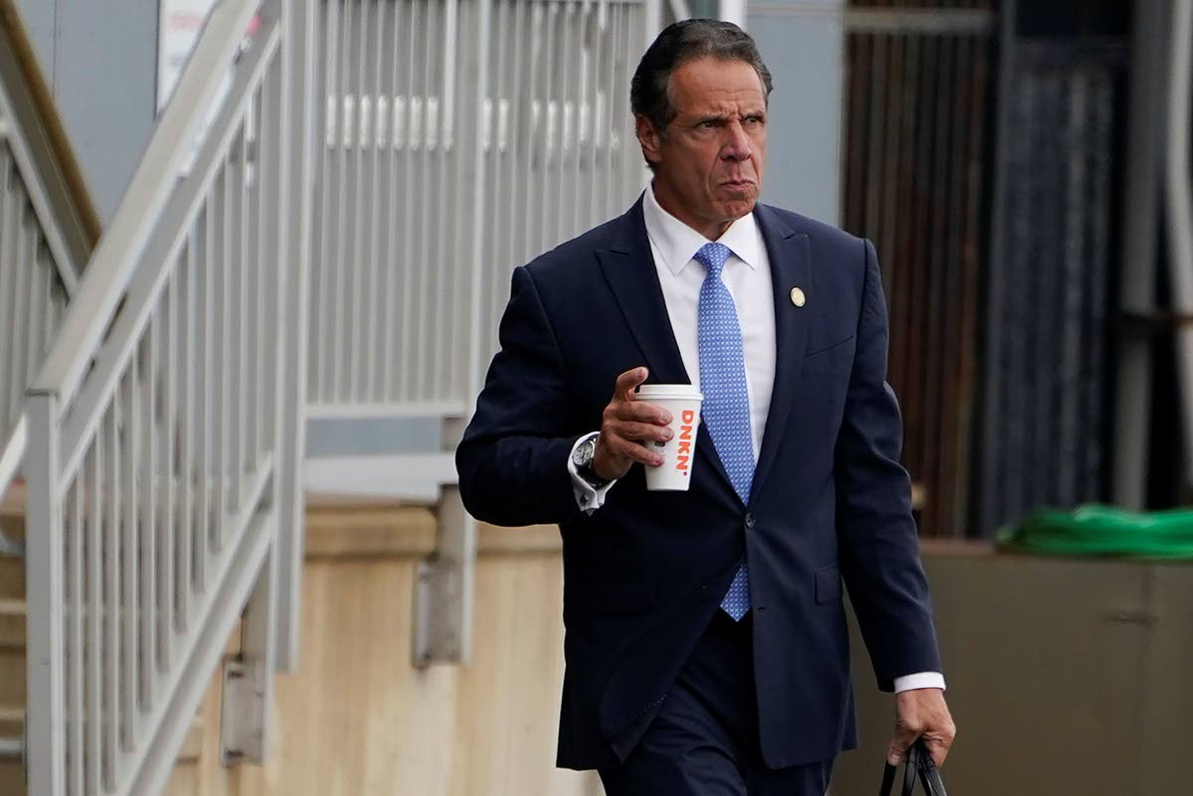 New York Gov. Andrew Cuomo prepares to board a helicopter after announcing his resignation Tuesday in New York.