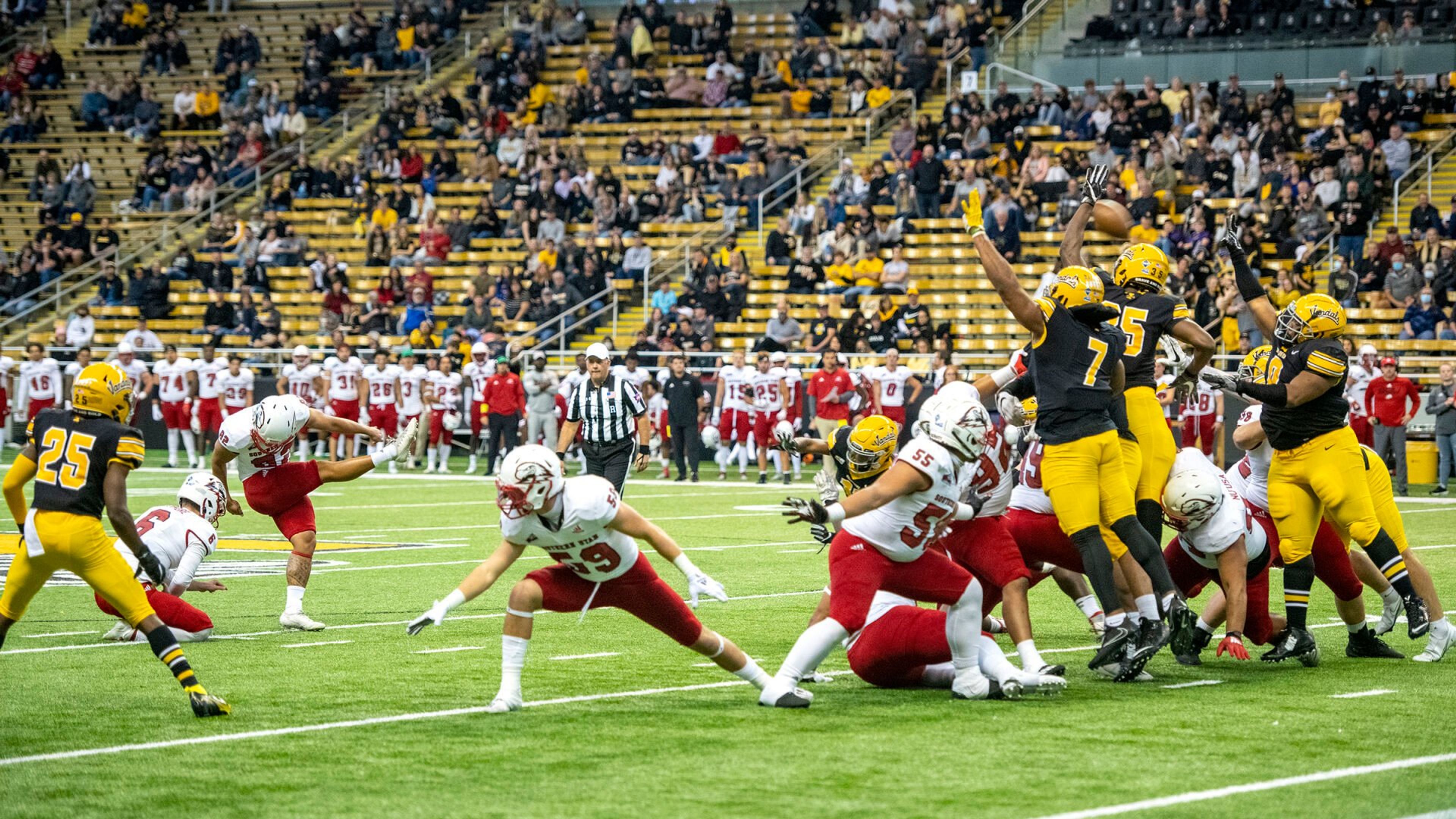 The Idaho Vandals tip a field-goal attempt by Southern Utah Thunderbirds kicker Noah Alejado (82) to end the second quarter of a Big Sky Conference game Nov. 6 at the Kibbie Dome.