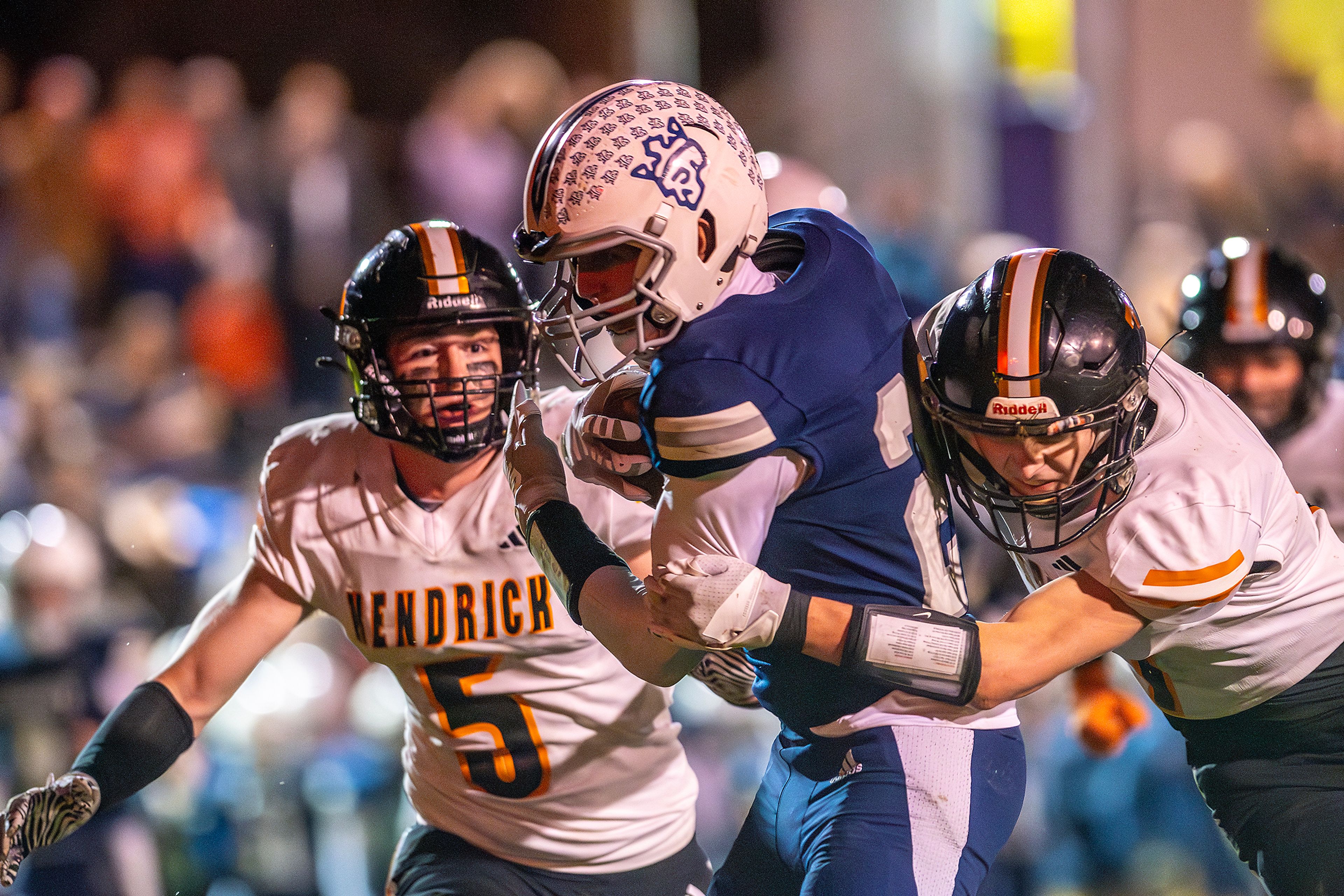 Logos wide receiver Baxter Covington runs in for a touchdown as Kendrick defensive lineman Kolt Koepp attempts to stop him in a semifinal game of the Idaho State Football Class 2A Championships Friday at Bengal Field in Lewiston.