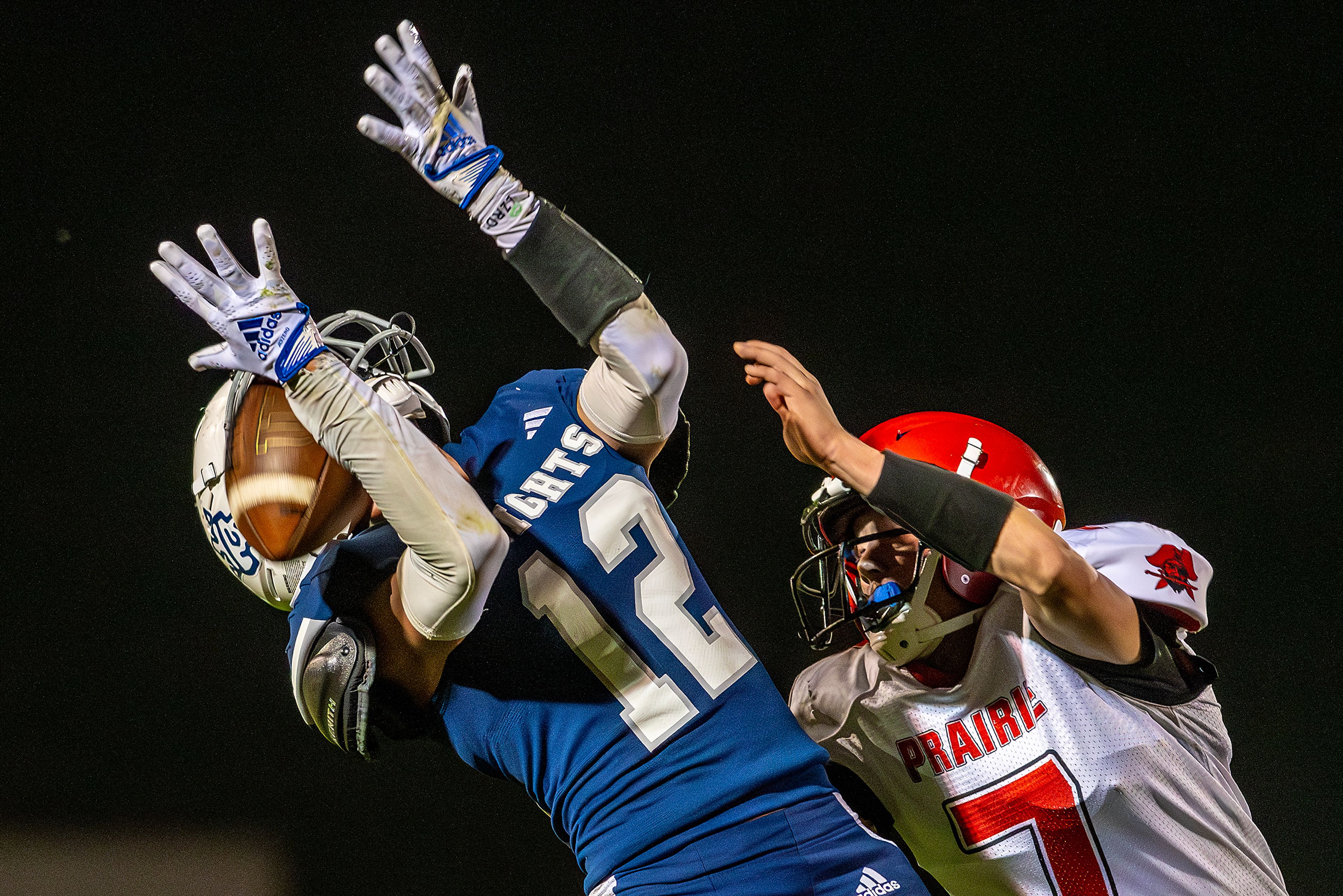 Logos Ryan Daniels misses a catch as Prairie Levi McElroy looks to break up the pass during a conference game Friday in Moscow.,