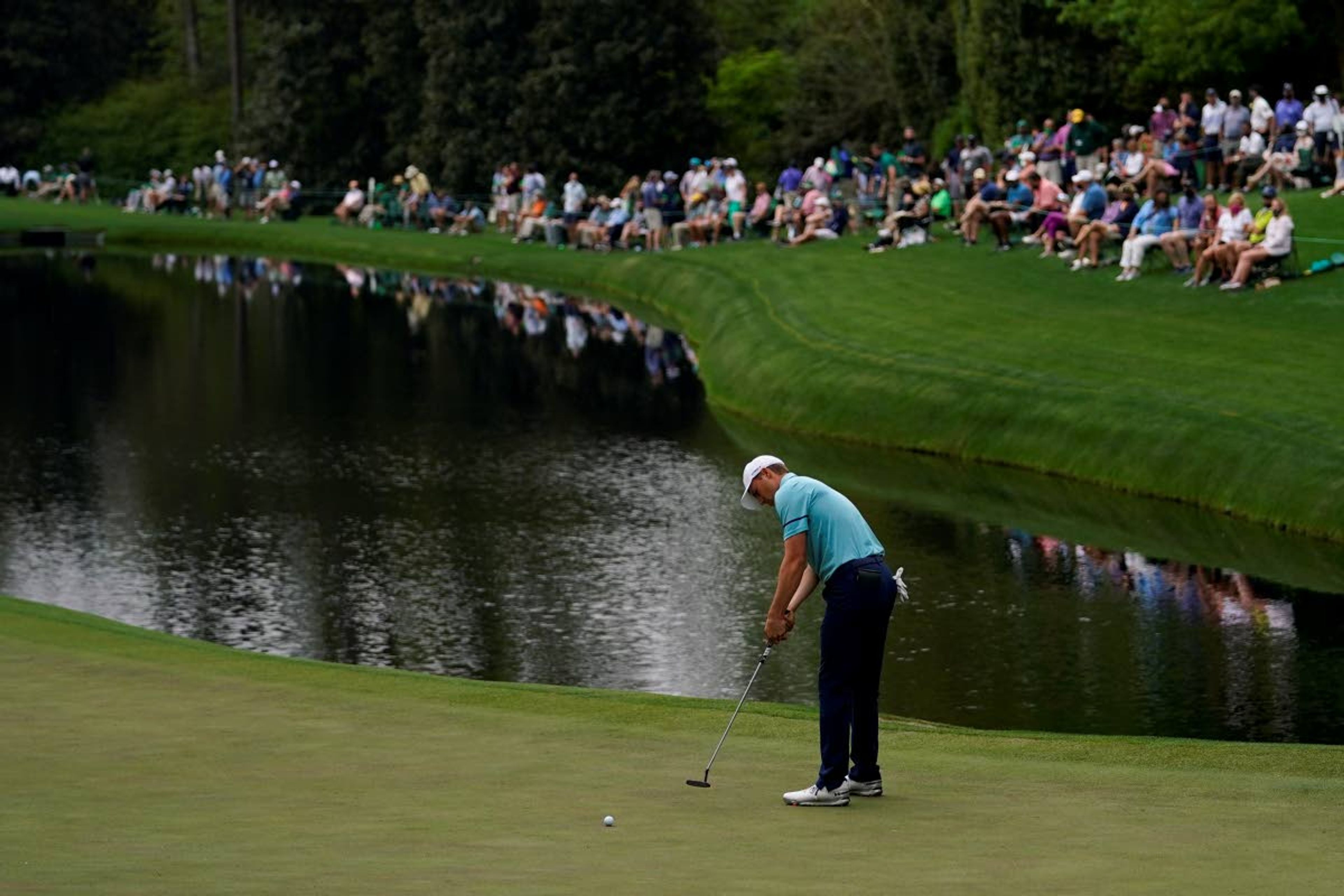 Jordan Spieth putts on the 16th green during the second round of the Masters golf tournament on Friday, April 9, 2021, in Augusta, Ga. (AP Photo/Matt Slocum)