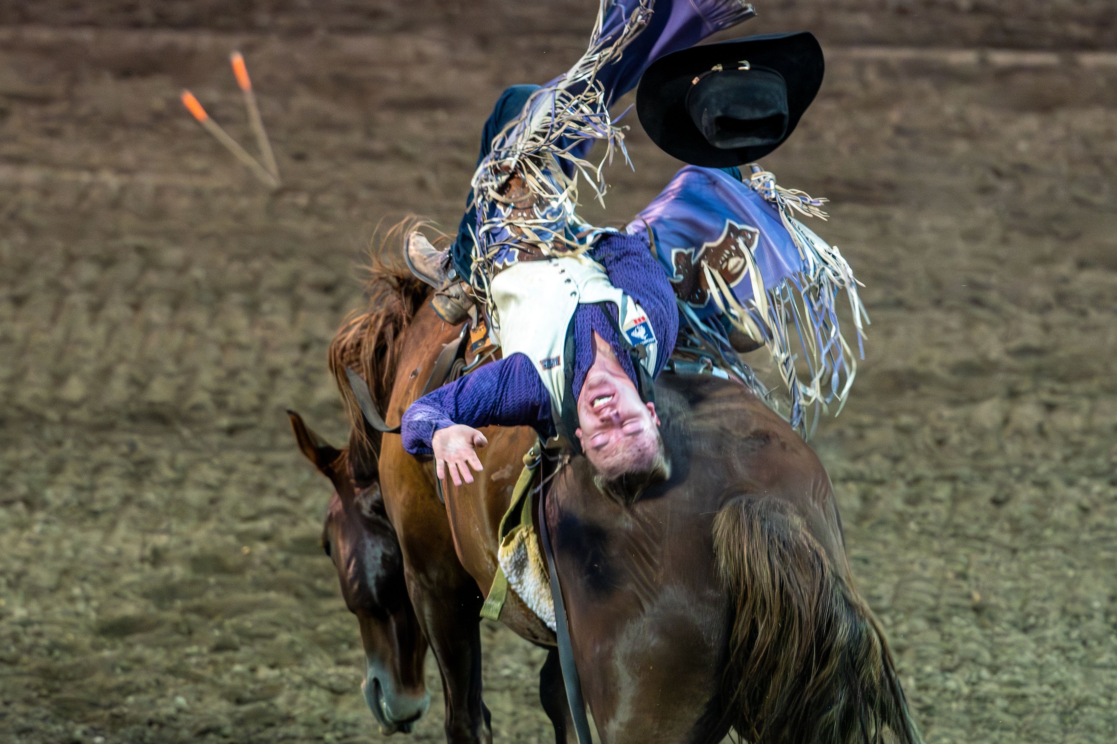 Hayden James rides Lewandowski’s Shouting Shoes in the bareback competition on day 3 of the Lewiston Roundup.