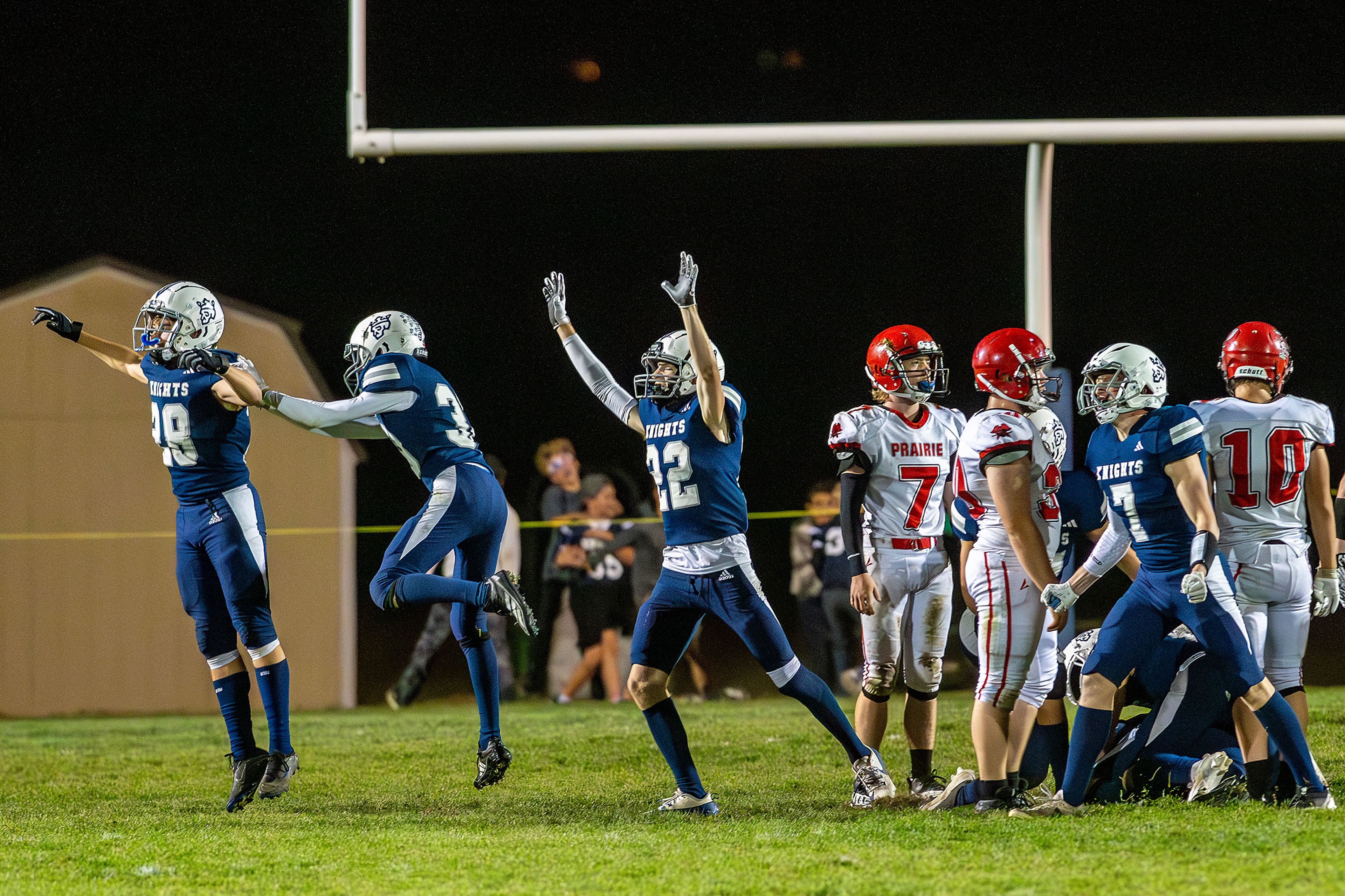 Logos celebrates reclaiming their own kickoff after a Prairie  fumble during a conference game Friday in Moscow.,