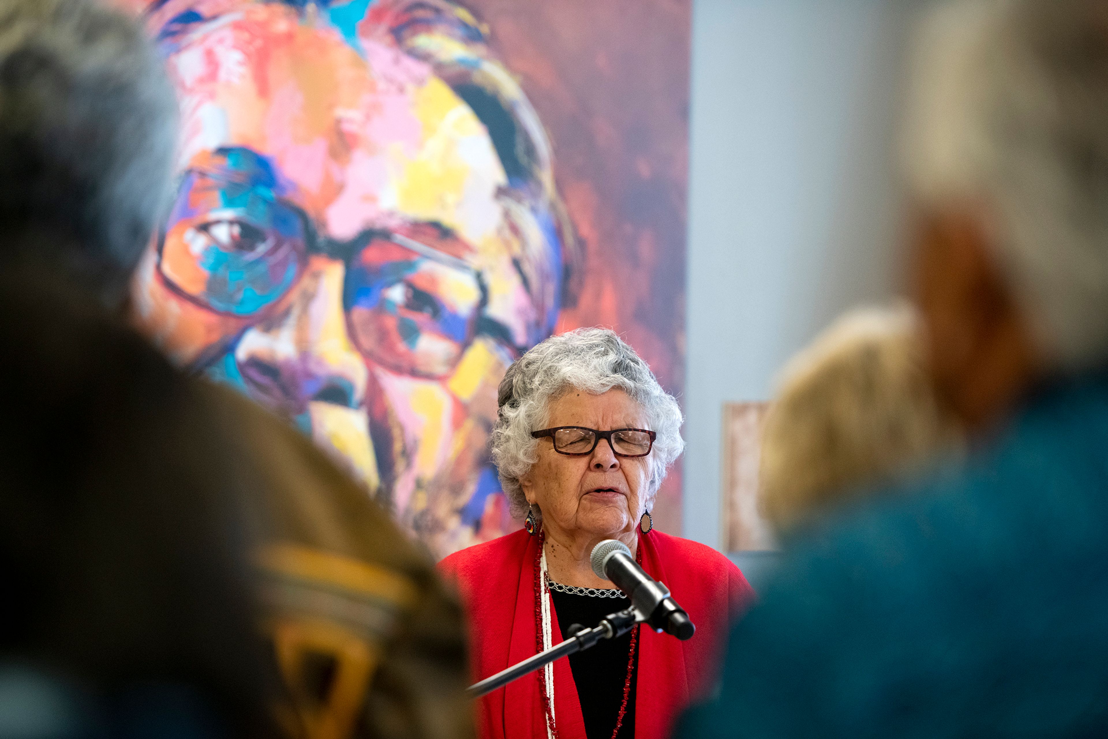 Councilwoman Mary Jane Miles leads a prayer at the University of Idaho during a dedication for the sculpture, “Sacagawea and Jean Baptiste,” inside Bruce M. Pitman Center’s Tribal Lounge in Moscow on Friday.