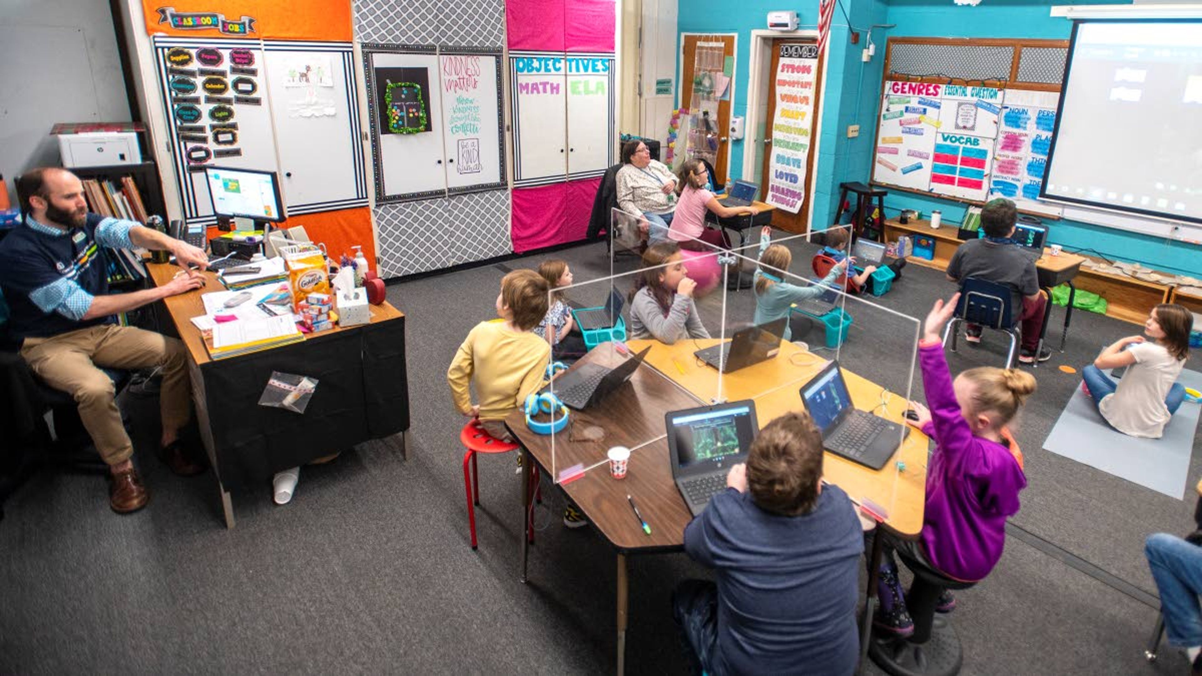 John Cassleman, the program manager of K-12 outreach at SEL, instructs a classroom of third graders how to code for a game called “Dragon Blast,” at Potlatch Elementary on Friday afternoon.