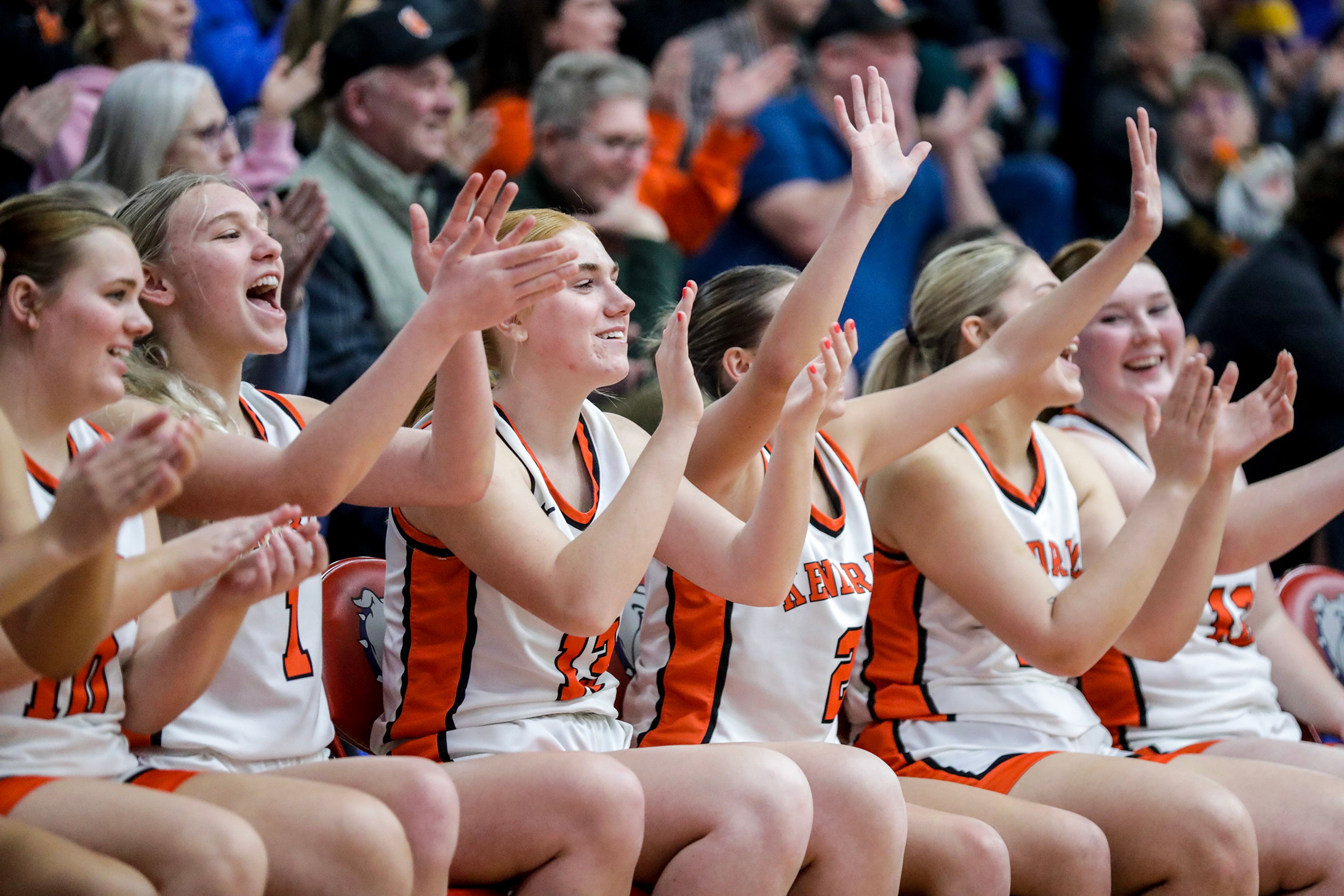 The Kendrick bench celebrates a point against Leadore during a quarterfinal game in the girls 1A DII state tournament Thursday at Nampa High School in Nampa.