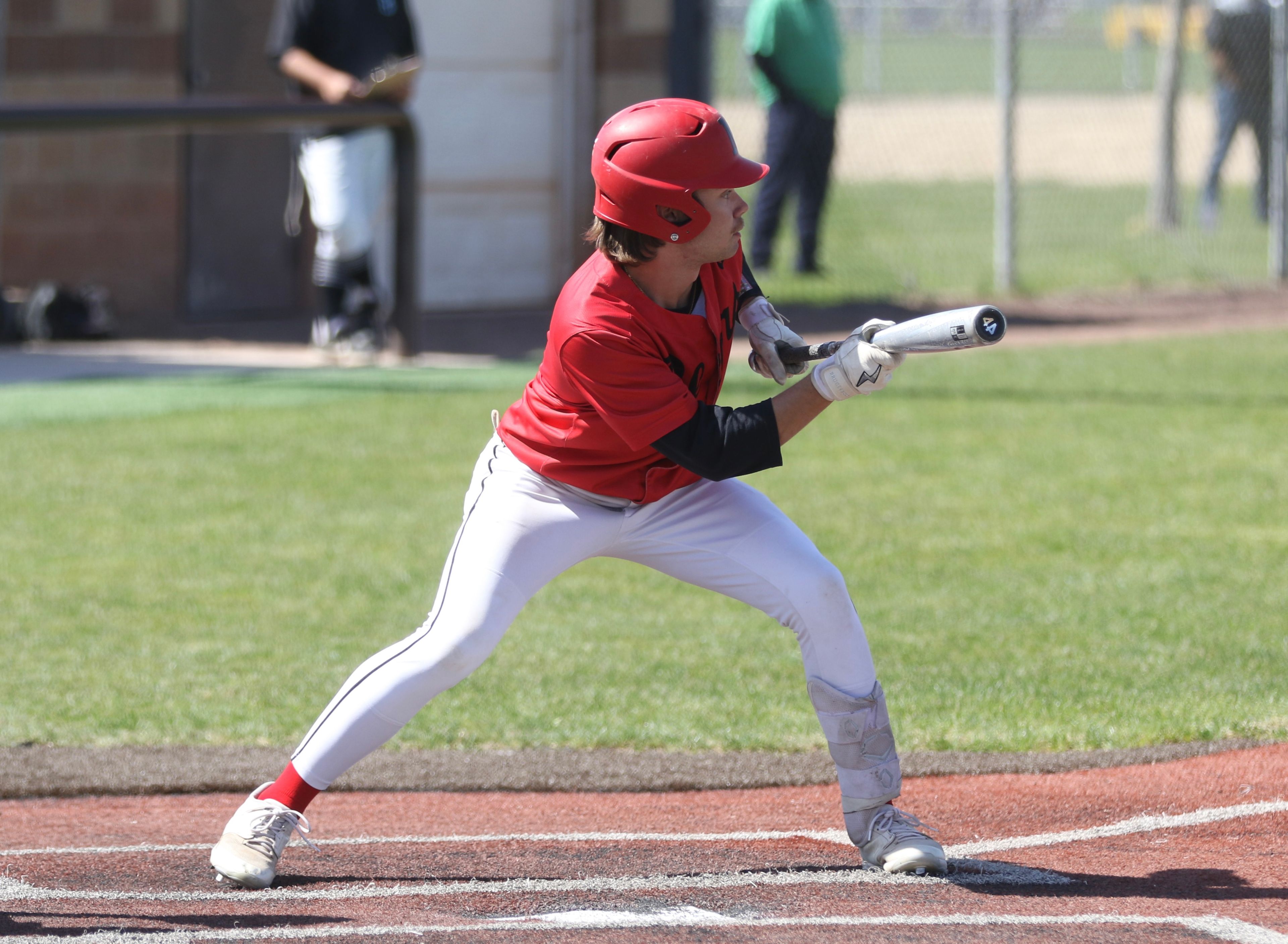 Moscow's Jamison Green lays down a bunt during an Idaho Class 4A state tournament game against Blackfoot at Vallivue High School in Caldwell, Idaho.