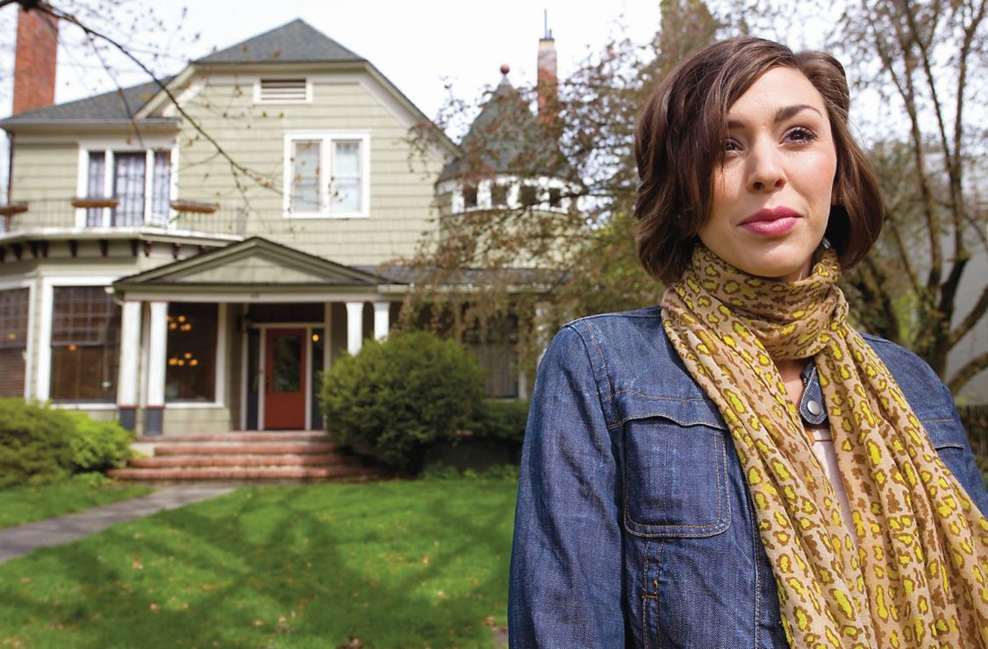 Natalie Greenfield stands in front of the home on B Street in Moscow where she lived as a teenager. Greenfield spoke Thursday at the University of Idaho about the sexual abuse and subsequent shaming she suffered during her teenage years while attending Christ Church in Moscow.