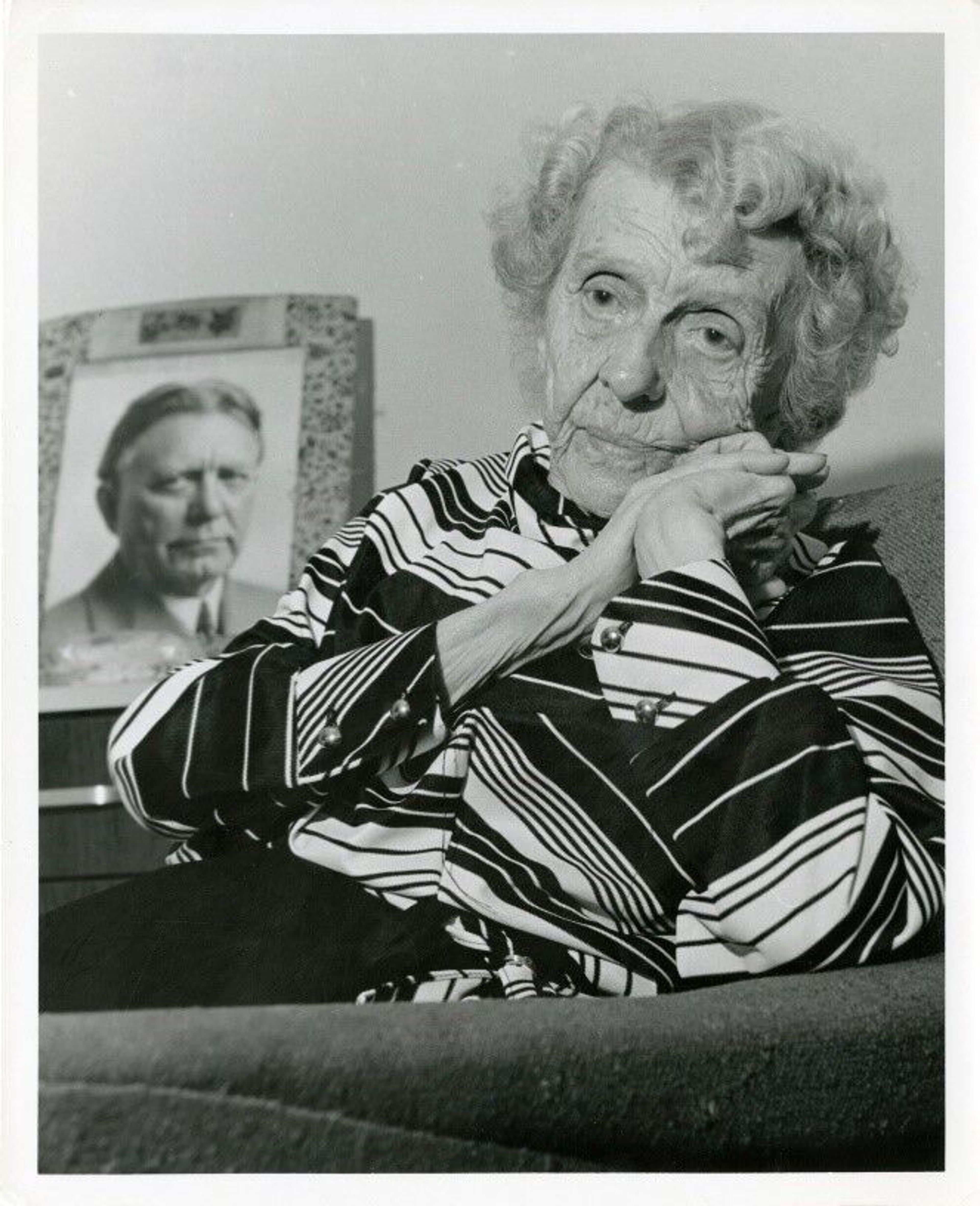 Mary McConnell Borah in her Oregon nursing home with William Borah's photo in the background.