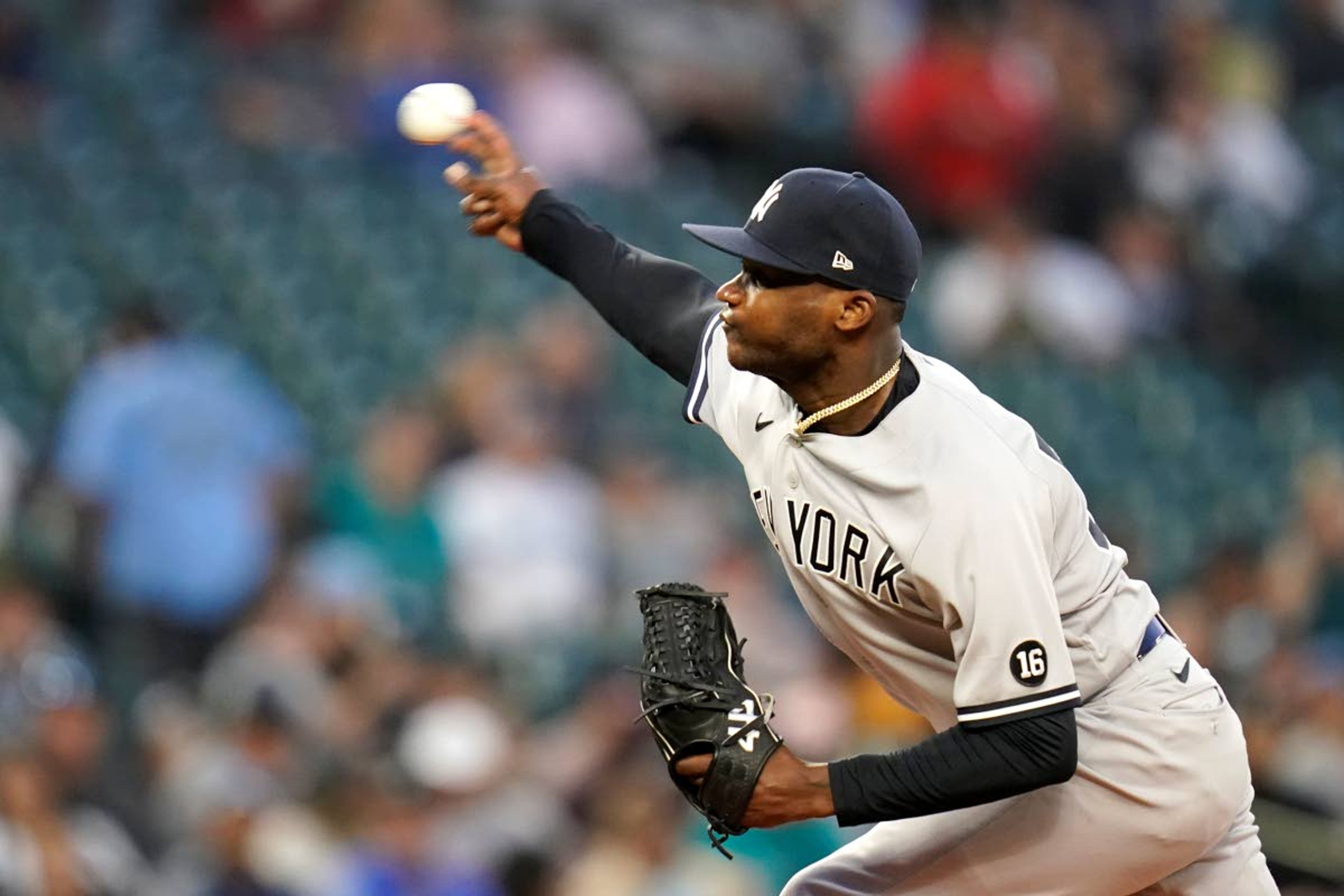 New York Yankees relief pitcher Domingo German, who had been scheduled to start the game, throws against the Seattle Mariners in the fifth inning of a baseball game Wednesday, July 7, 2021, in Seattle. (AP Photo/Elaine Thompson)