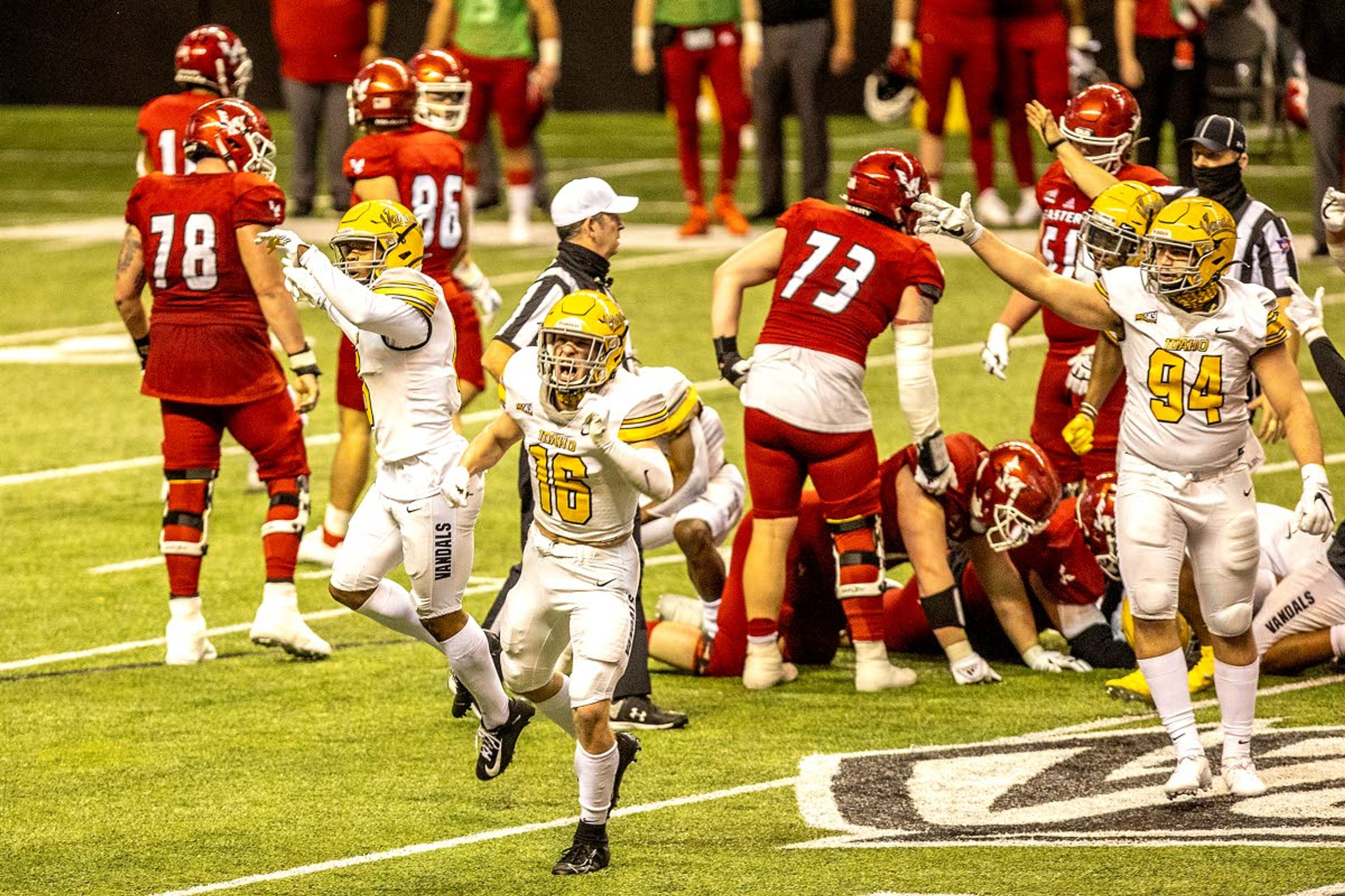 The Idaho Vandals celebrate taking possession of a fumble against Eastern Washington in the third quarter of an NCAA college football game, in Moscow, Idaho. Idaho defeated Eastern Washington 28-21.