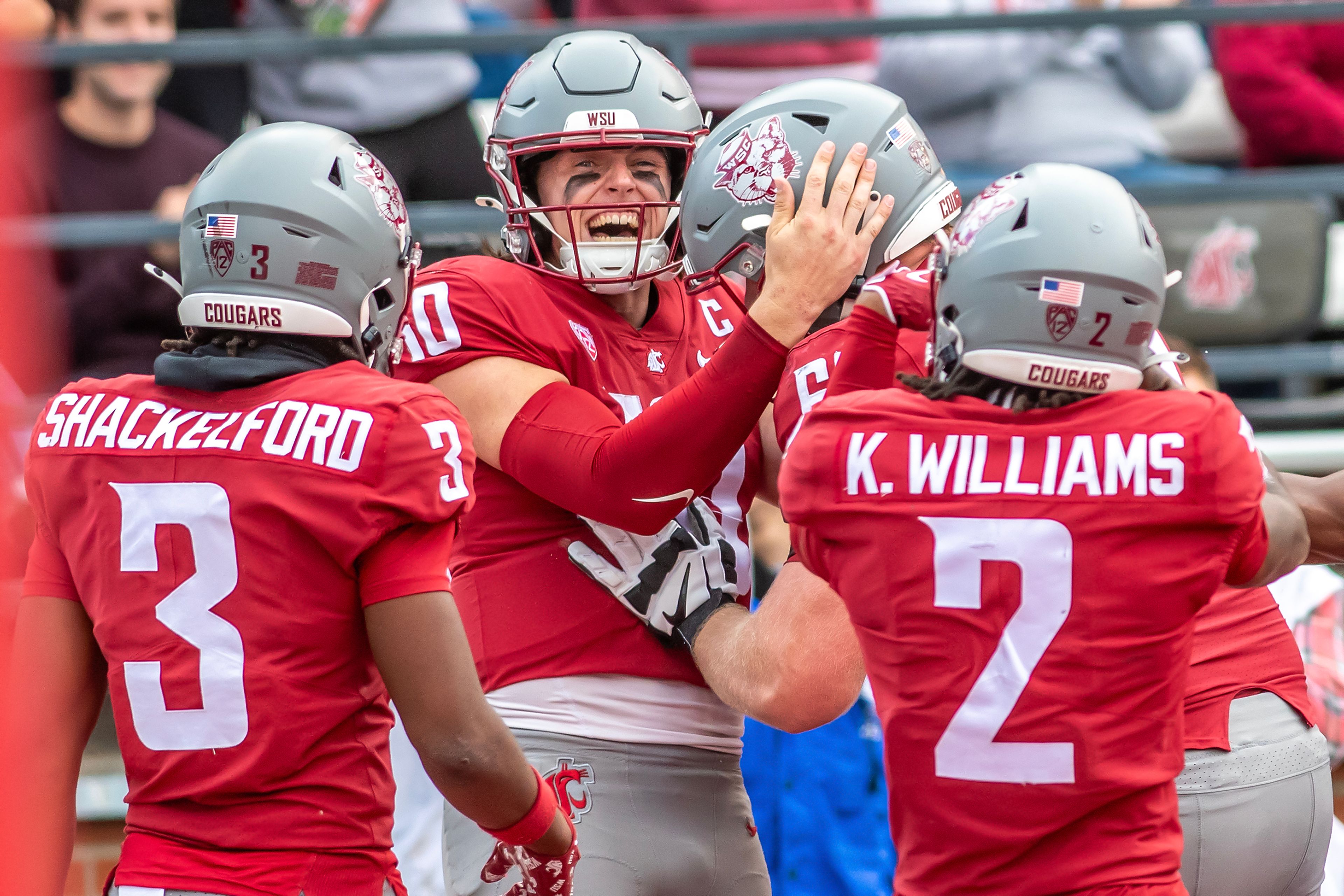 Washington State quarterback John Mateer celebrates a touchdown against Hawaii in a college football game on Saturday at Gesa Field in Pullman. WSU defeated Hawaii 42-10.