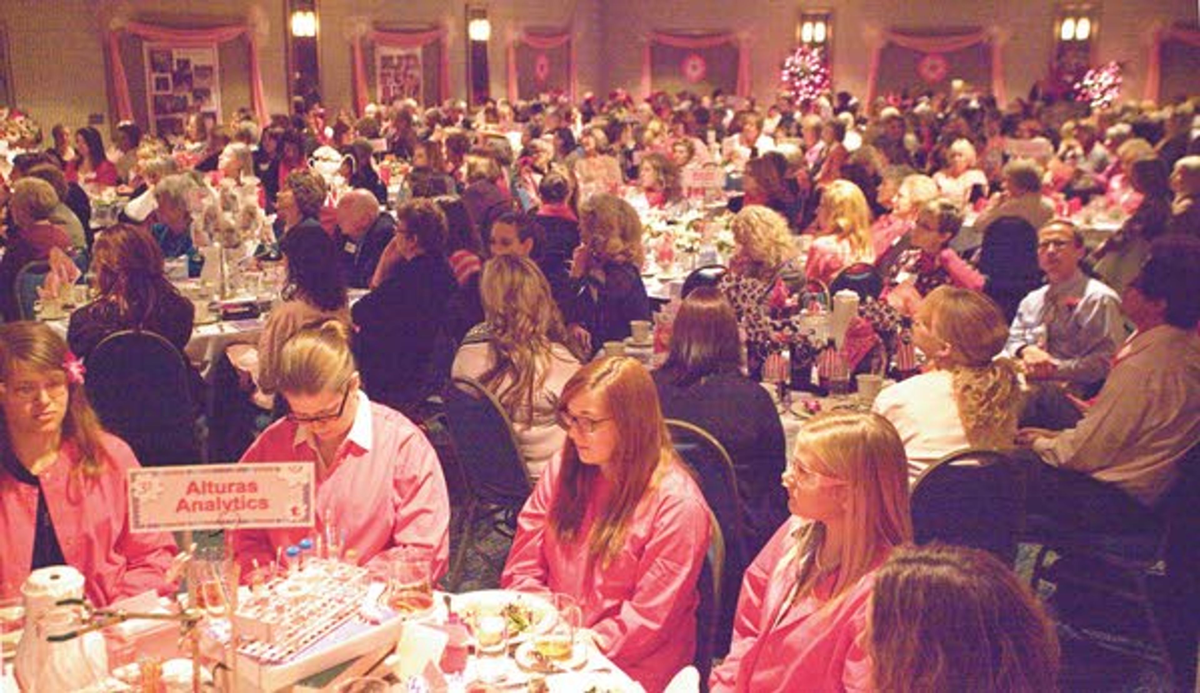 Attendees listen to the speakers Tuesday during the 12th Annual Pink Tea sponsored by Gritman Medical Center at the Best Western Plus University Inn in Moscow. The Pink Tea raises money for the Bosom Buddies program that provides free mammograms at Gritman to those who cannot afford one.