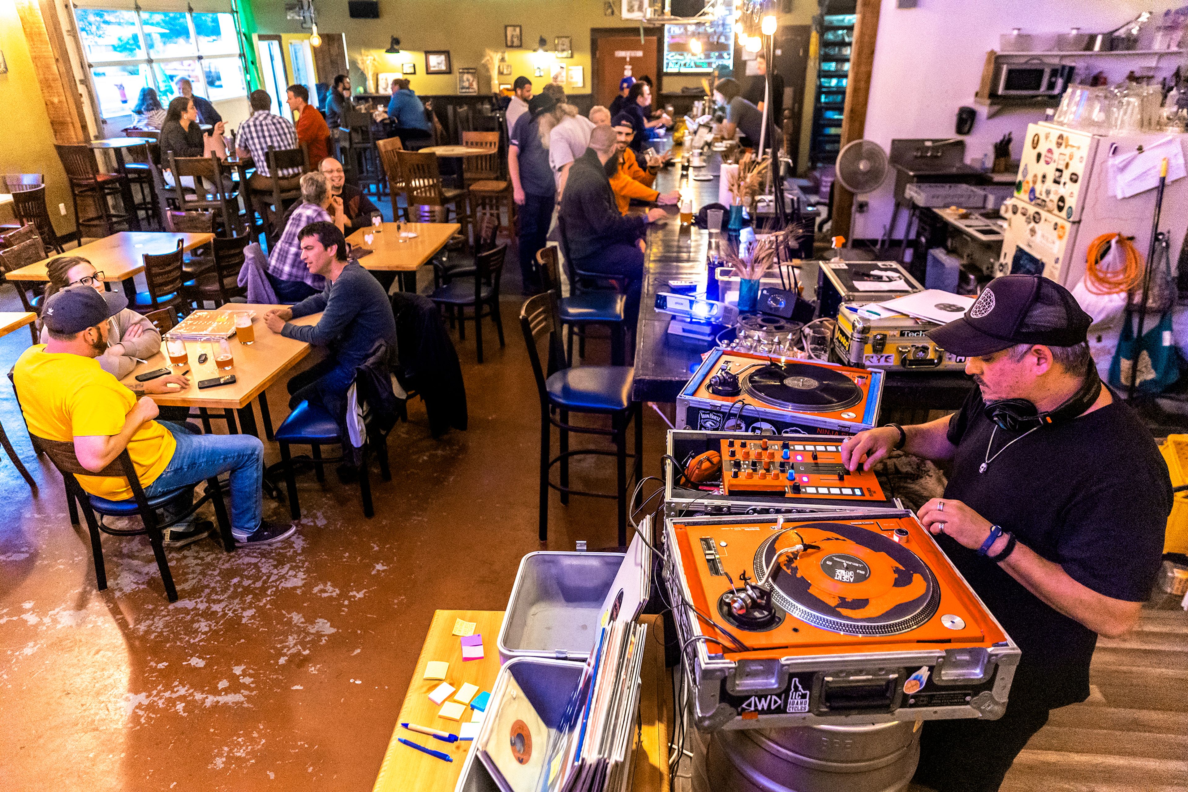 David Campillo plays vinyl people brought in during Bring Your Own Vinyl Night Wednesday at Moscow Brewing Company.