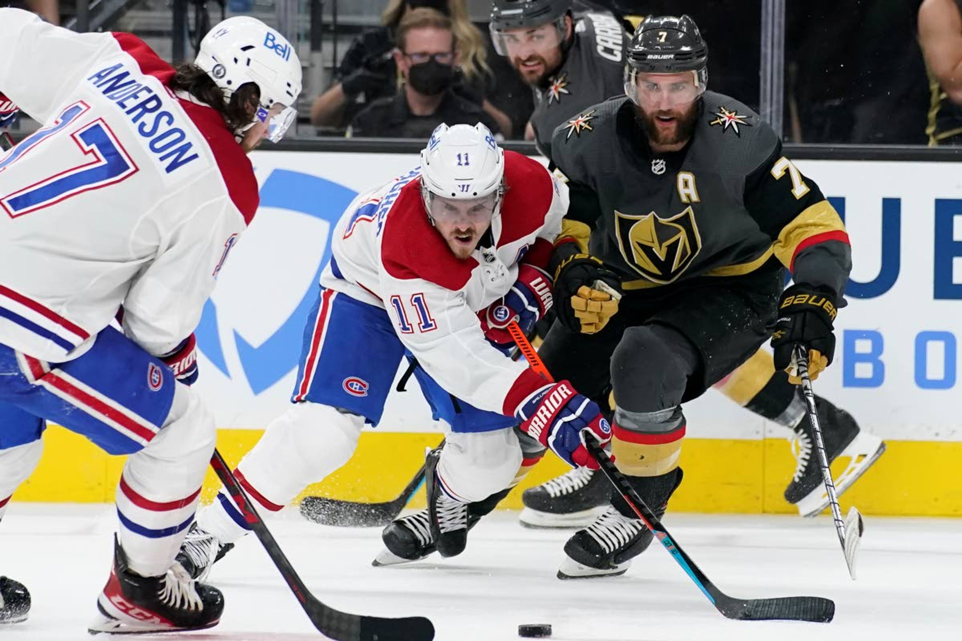 Montreal Canadiens right wing Brendan Gallagher (11) vies for the puck with Vegas Golden Knights defenseman Alex Pietrangelo (7) during the third period in Game 1 of an NHL hockey Stanley Cup semifinal playoff series Monday, June 14, 2021, in Las Vegas. (AP Photo/John Locher)