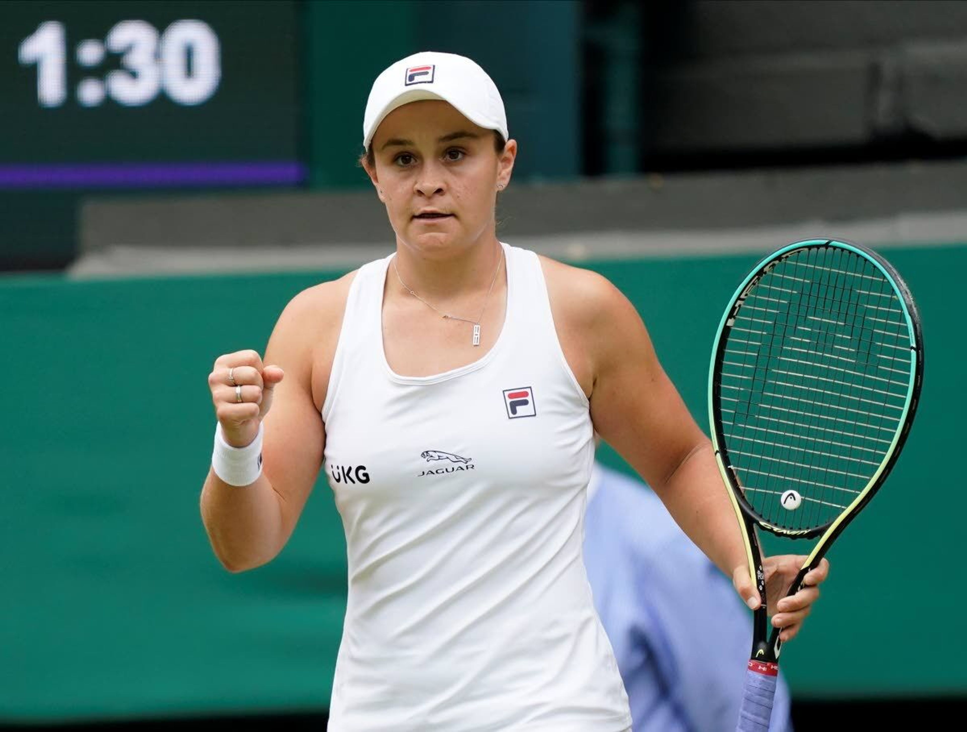 Australia's Ashleigh Barty celebrates winning the women's singles second round match against Russia's Anna Blinkova on day four of the Wimbledon Tennis Championships in London, Thursday July 1, 2021. (AP Photo/Alberto Pezzali)