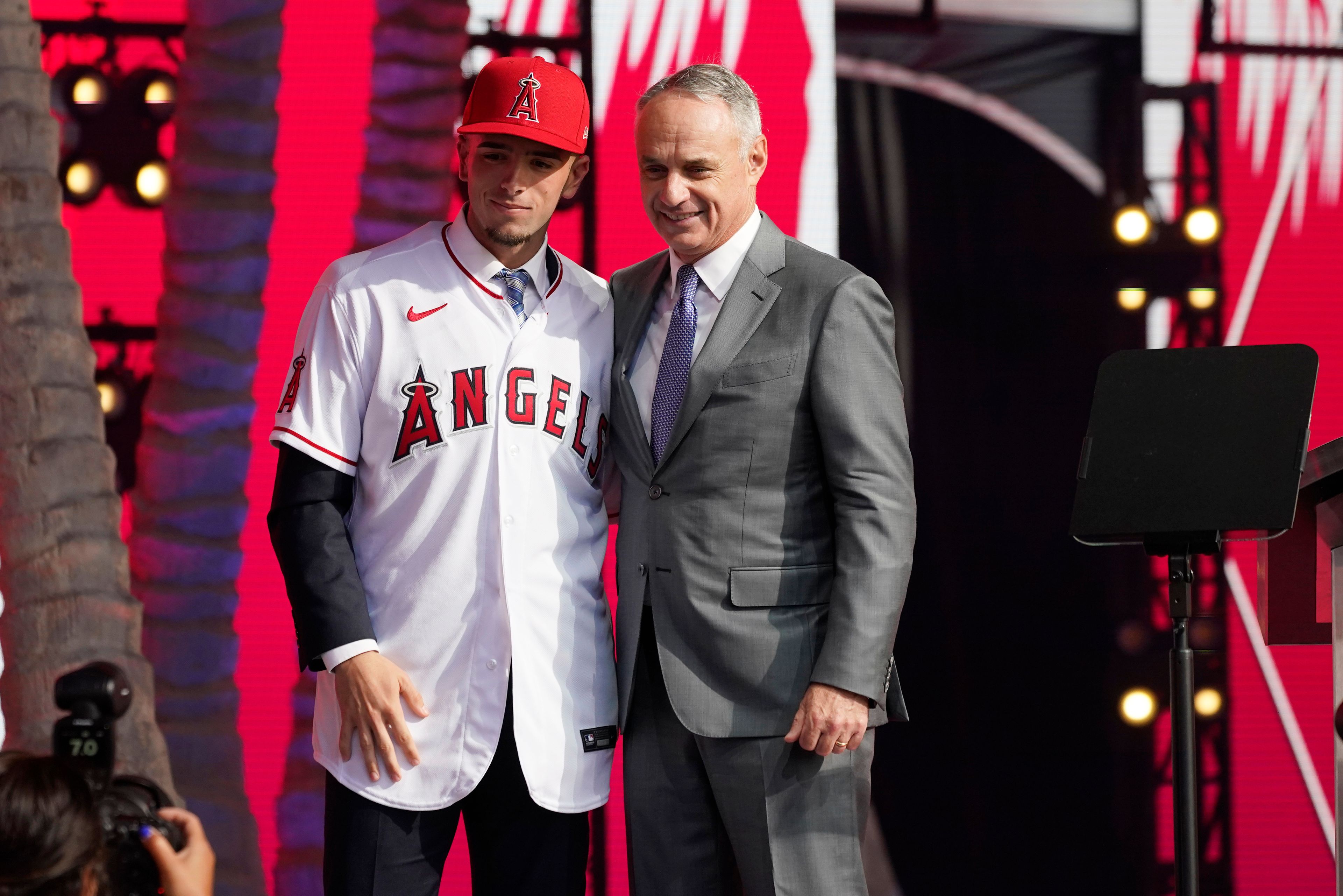 Associated PressZach Neto poses for photos with MLB Commissioner Rob Manfred after being selected by the Los Angeles Angels with the 13th pick of the 2022 MLB draft, Sunday in Los Angeles.