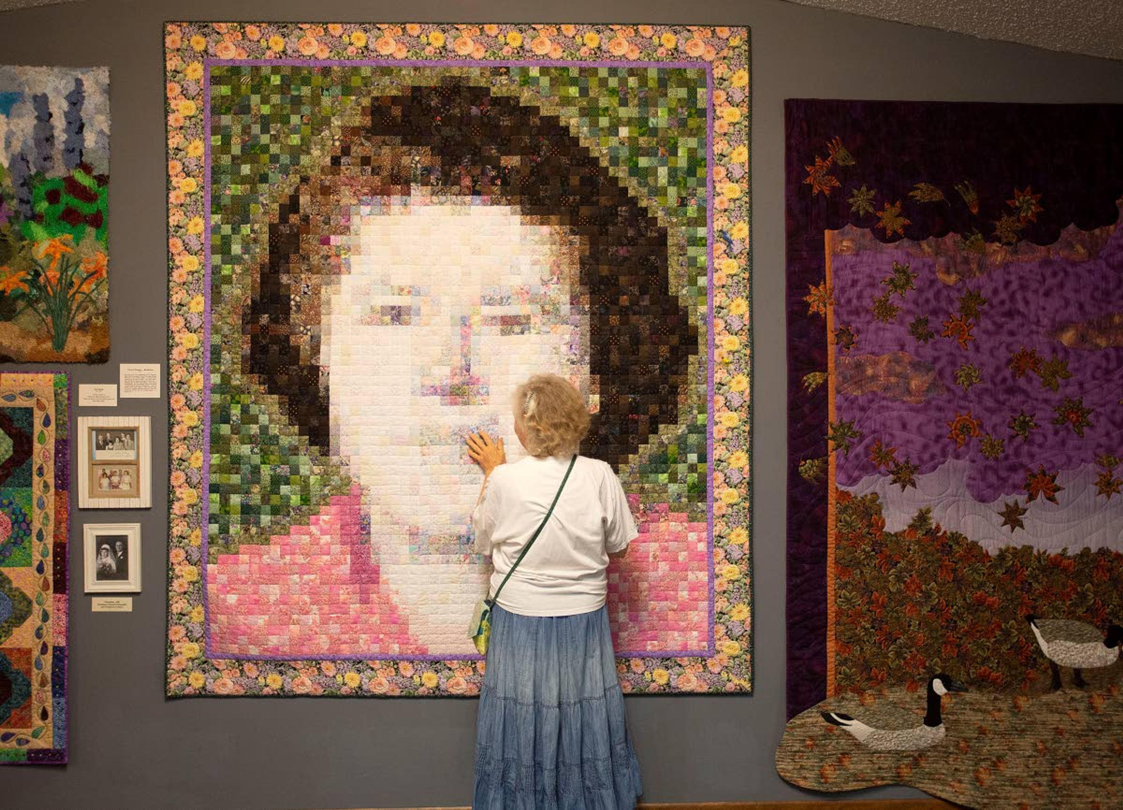 Genesee quilter Karen Schoepflin Hagen talks about her 2011 quilt, "Face of Flowers — My Mother." The quilt is part of a display at Kascha Quilts in Genesee.