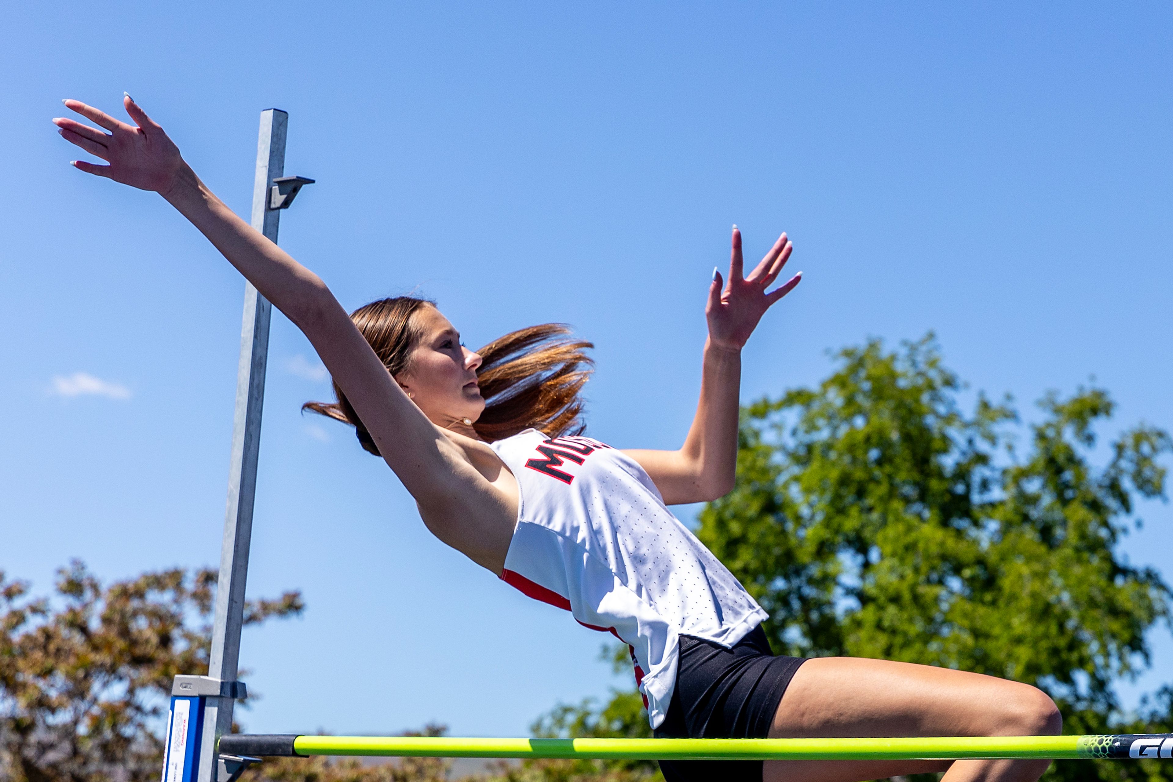 Moscow’s Taylor McLuen clears the bar in the high jump Thursday at the Meet of Champions at Sweeney Track and Vollmer Bowl in Lewiston.