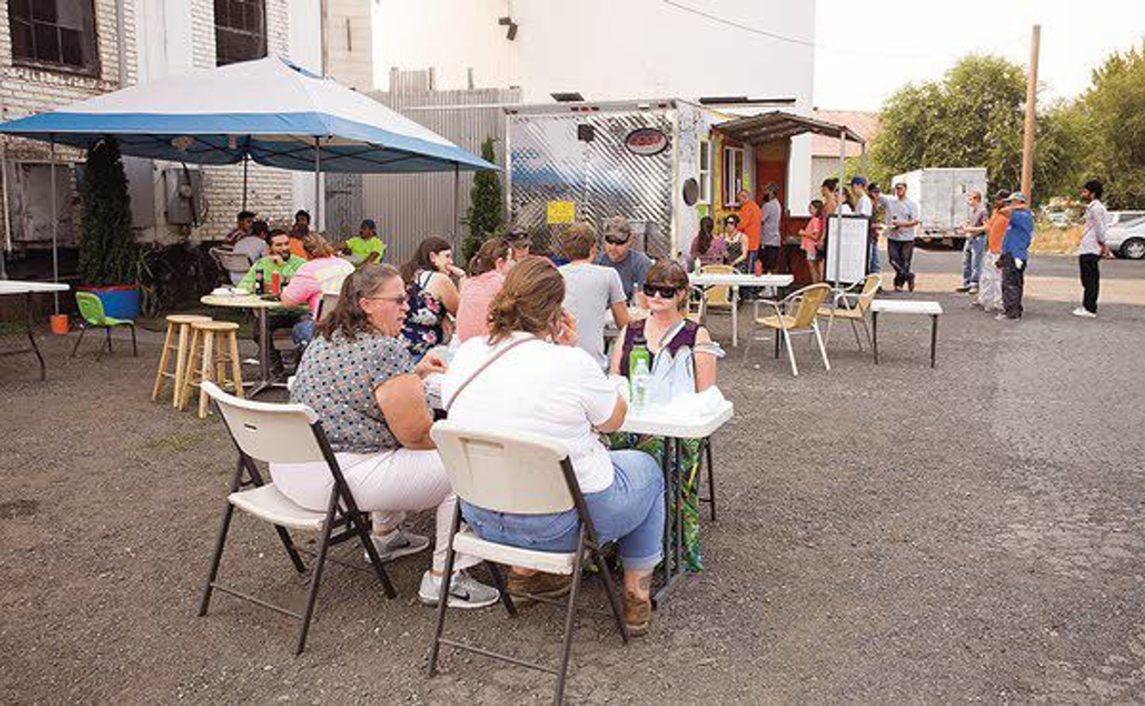 Customers line up for Taco Tuesday at Taqueria Las Torres in Moscow.