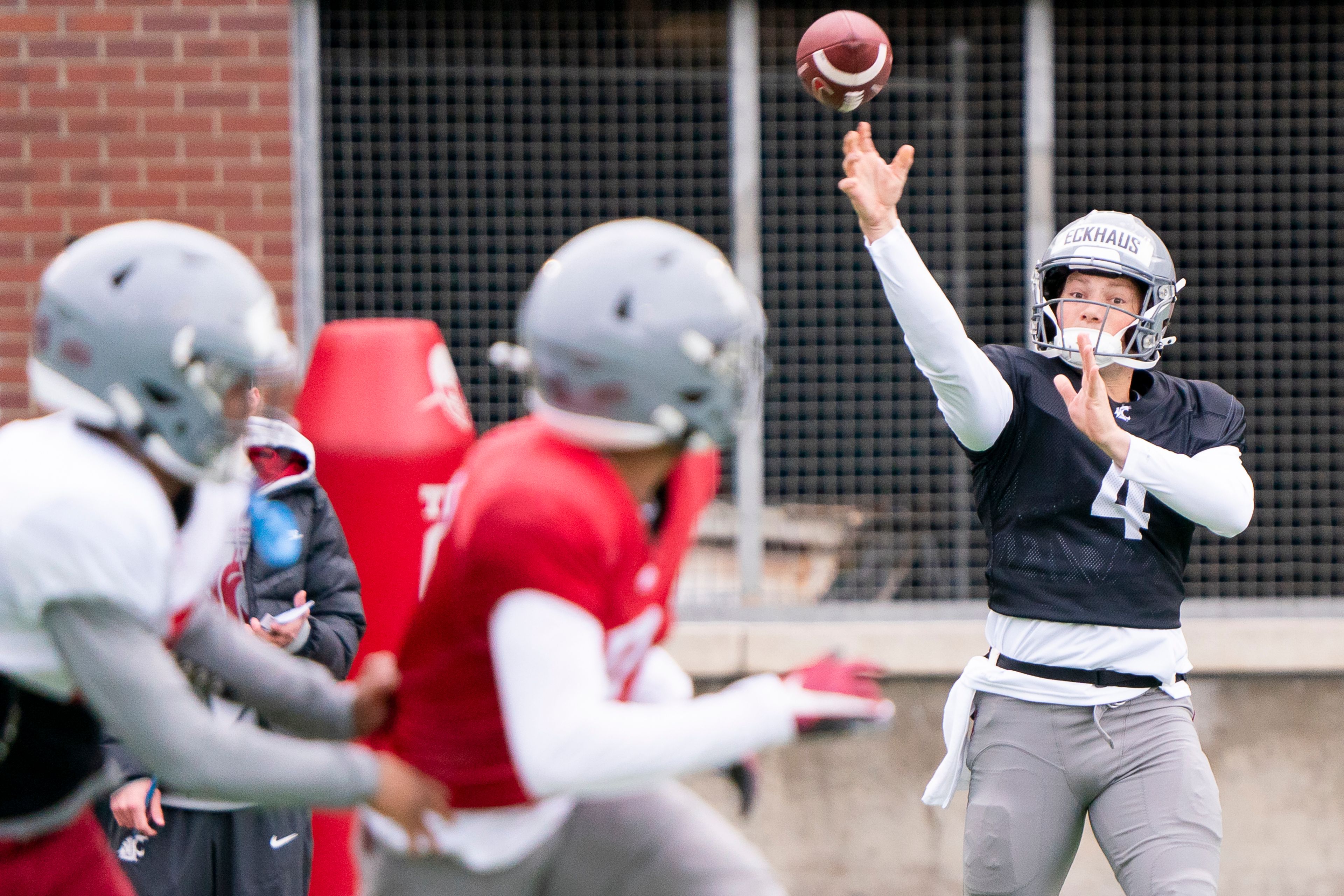 Washington State’s Zevi Eckhaus (4) throws the ball during a practice April 9 morning at the Cougar Football Complex in Pullman.