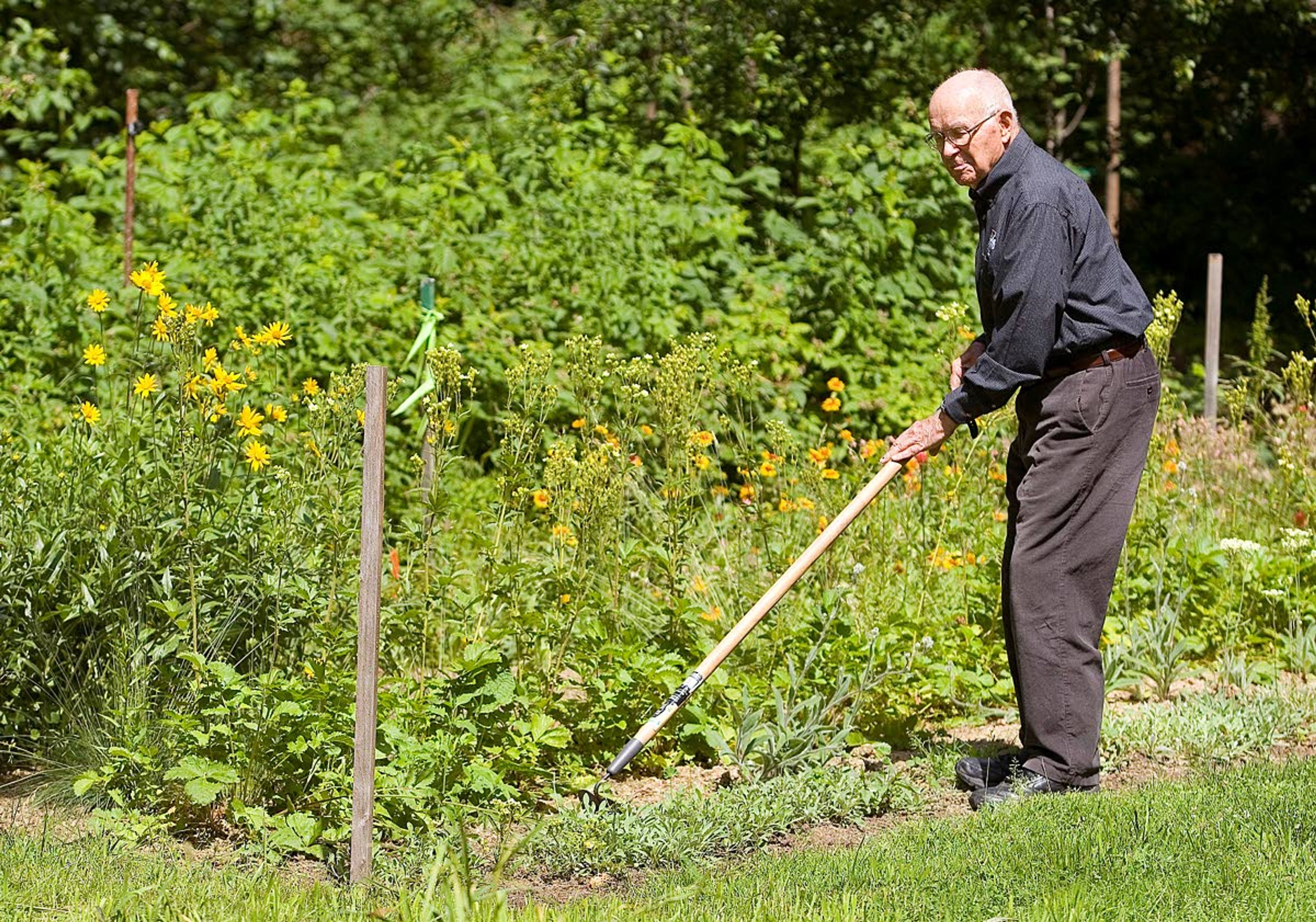 Maynard Fosberg works in the garden outside his home in Moscow in this photograph taken in 2012.