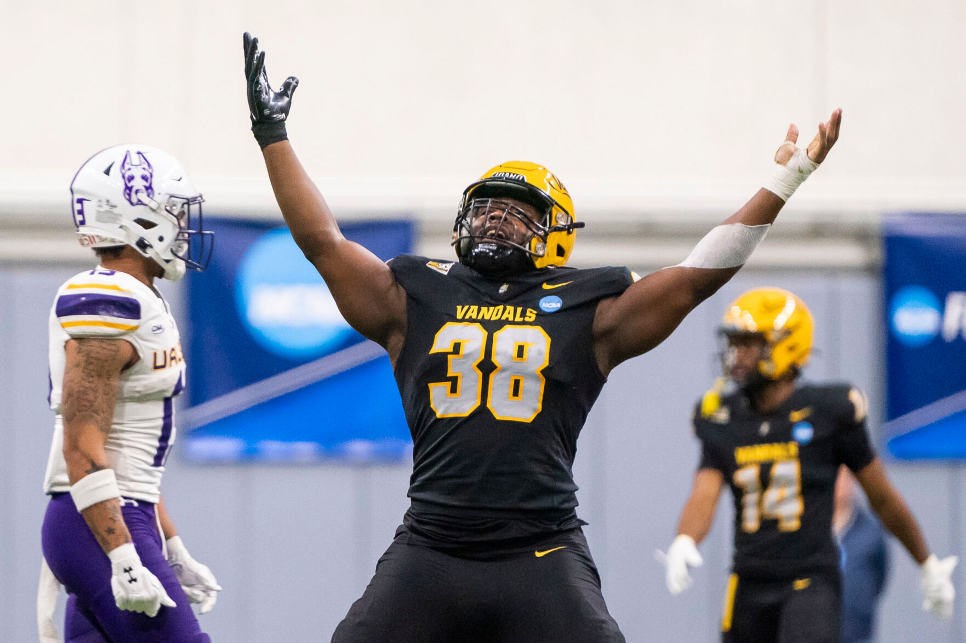 Idaho Vandals defensive lineman Tylen Coleman (38) celebrates after getting a tackle for a loss during their game against Albany in the third round of the 2023 Division I FCS Football Championship on Saturday inside the Kibbie Dome in Moscow.