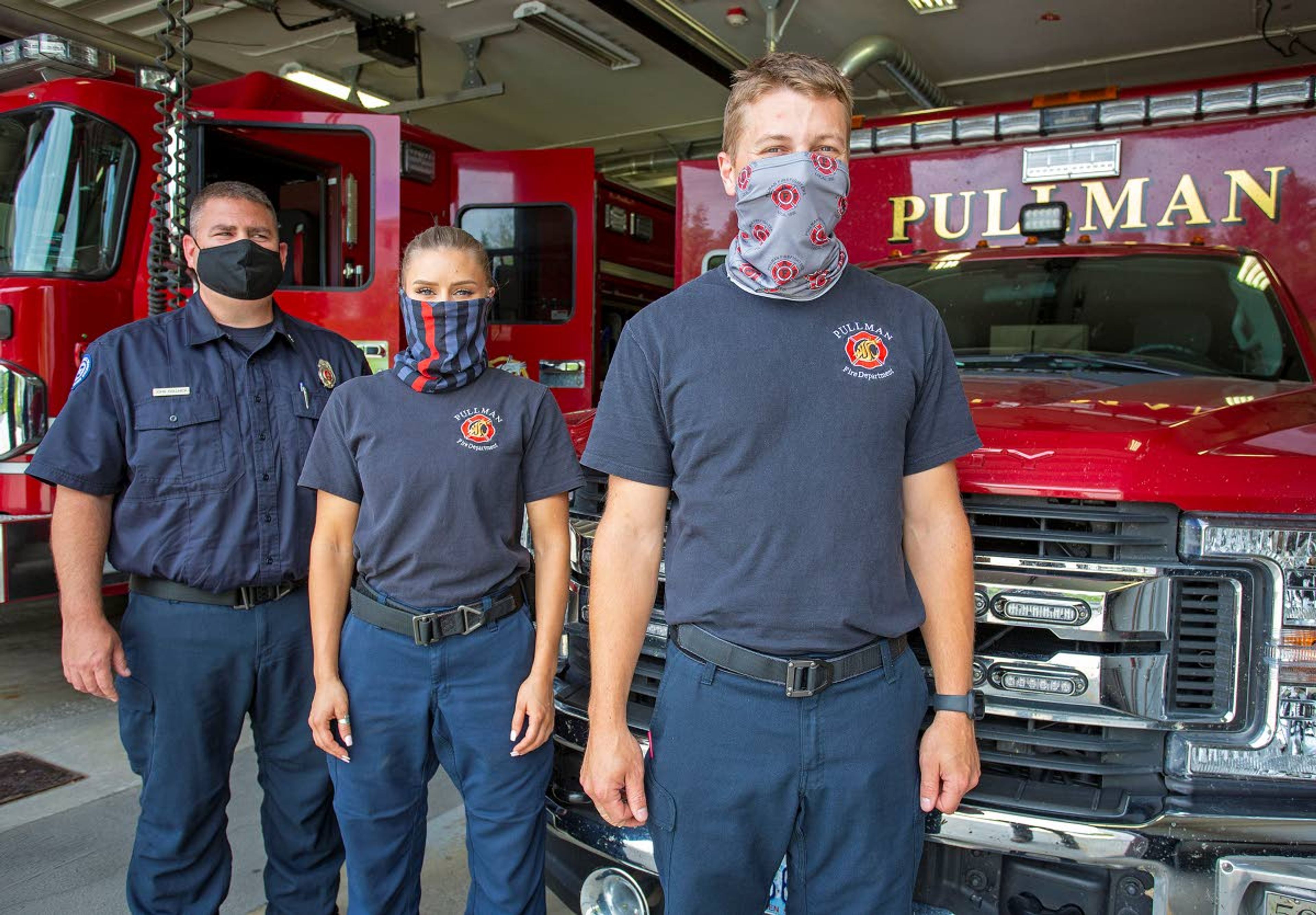 John Gollnick, left to right, Crystal Hillestad and Christian Schad are firefighters at the Pullman Fire Department.