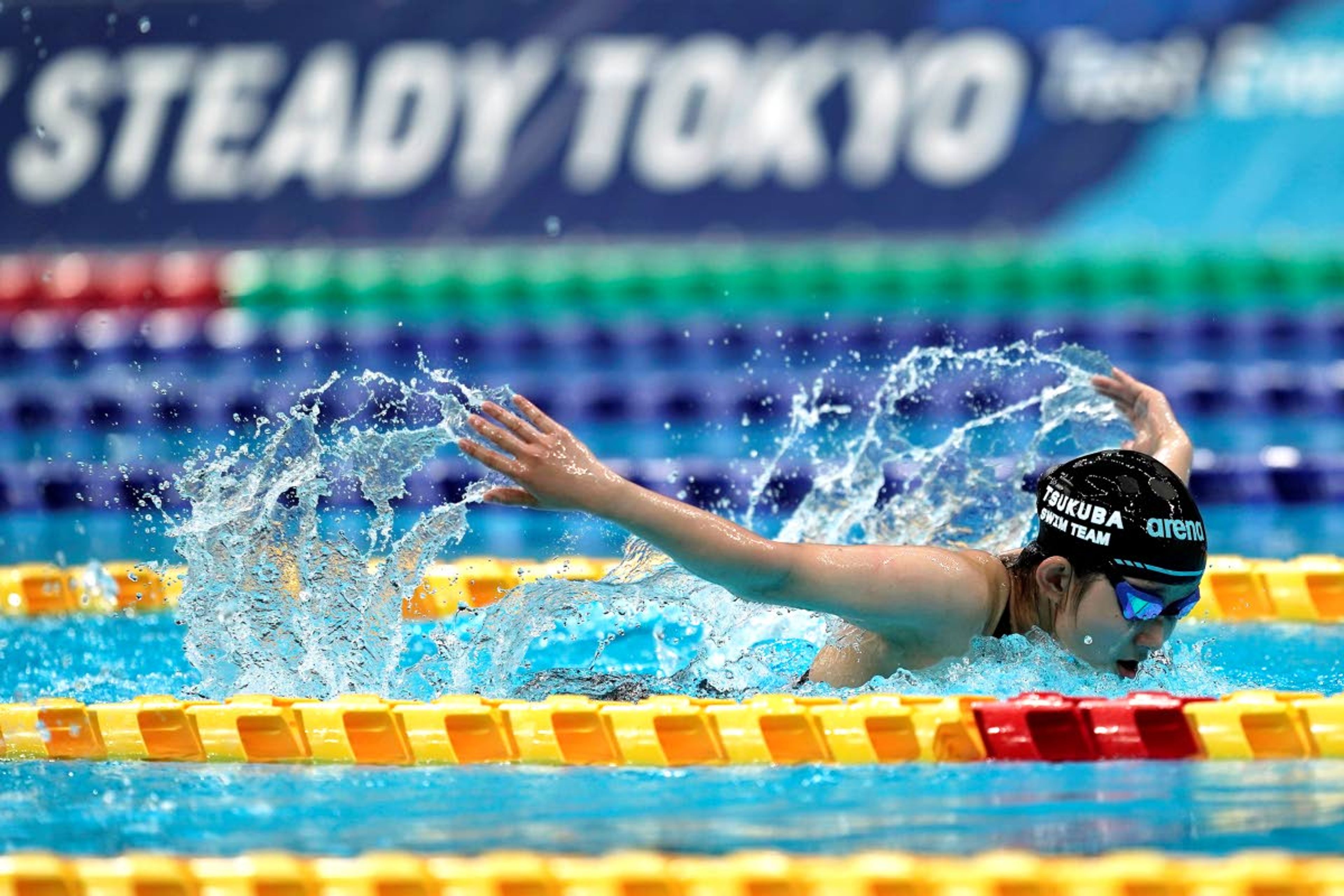 FILE - In this April 26, 2021, file photo, a Japanese swimmer demonstrates during a Paralympic swimming test event at the Tokyo Aquatics Center, one of the venues of the Tokyo 2020 Olympic and Paralympic Games in Tokyo. IOC officials say the Tokyo Olympics will open on July 23 and almost nothing now can stop the games from going forward.(AP Photo/Eugene Hoshiko, File)