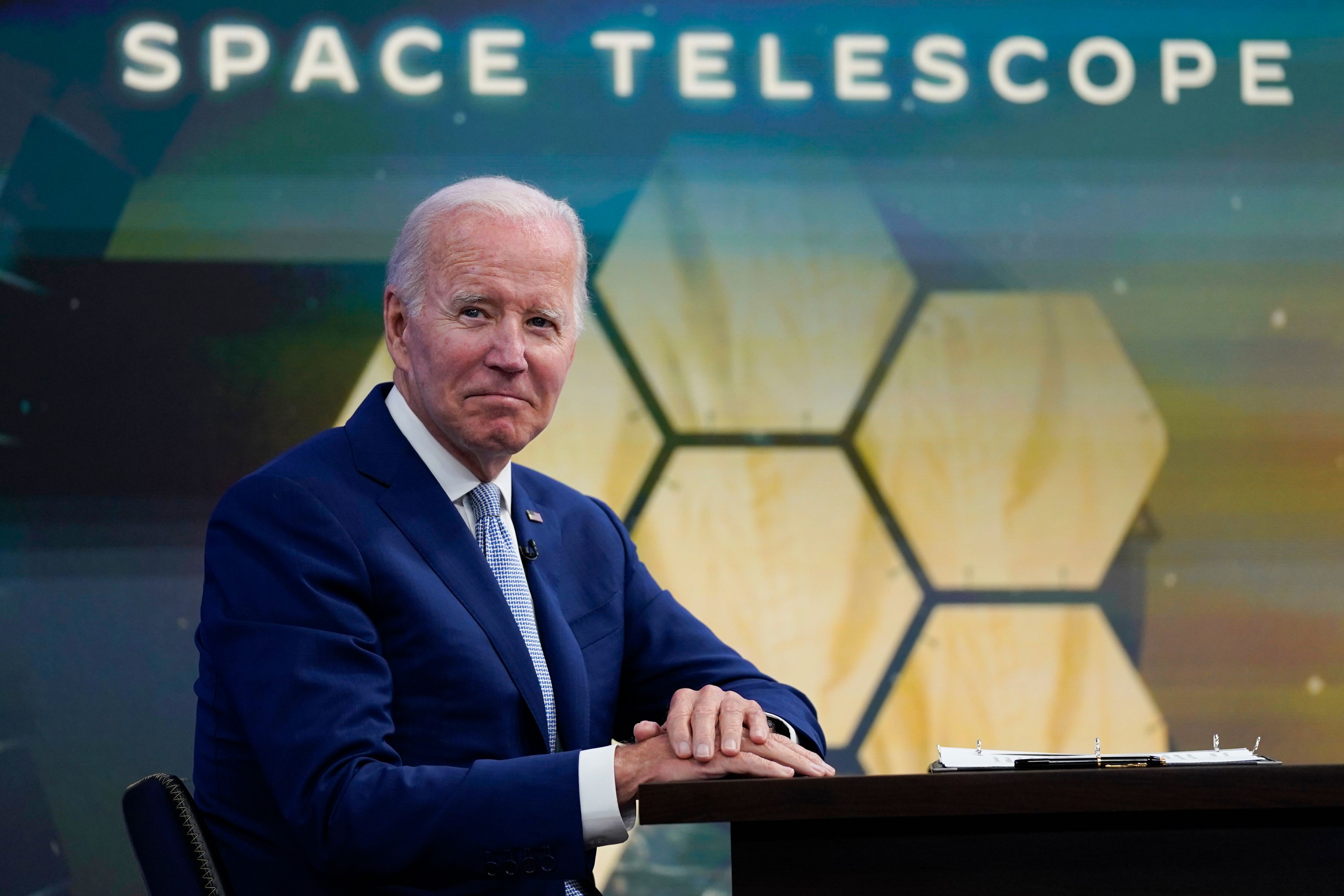 President Joe Biden listens during a briefing from NASA officials about the first images from the Webb Space Telescope, the highest-resolution images of the infrared universe ever captured, in the South Court Auditorium on the White House complex, Monday, July 11, 2022, in Washington. (AP Photo/Evan Vucci)