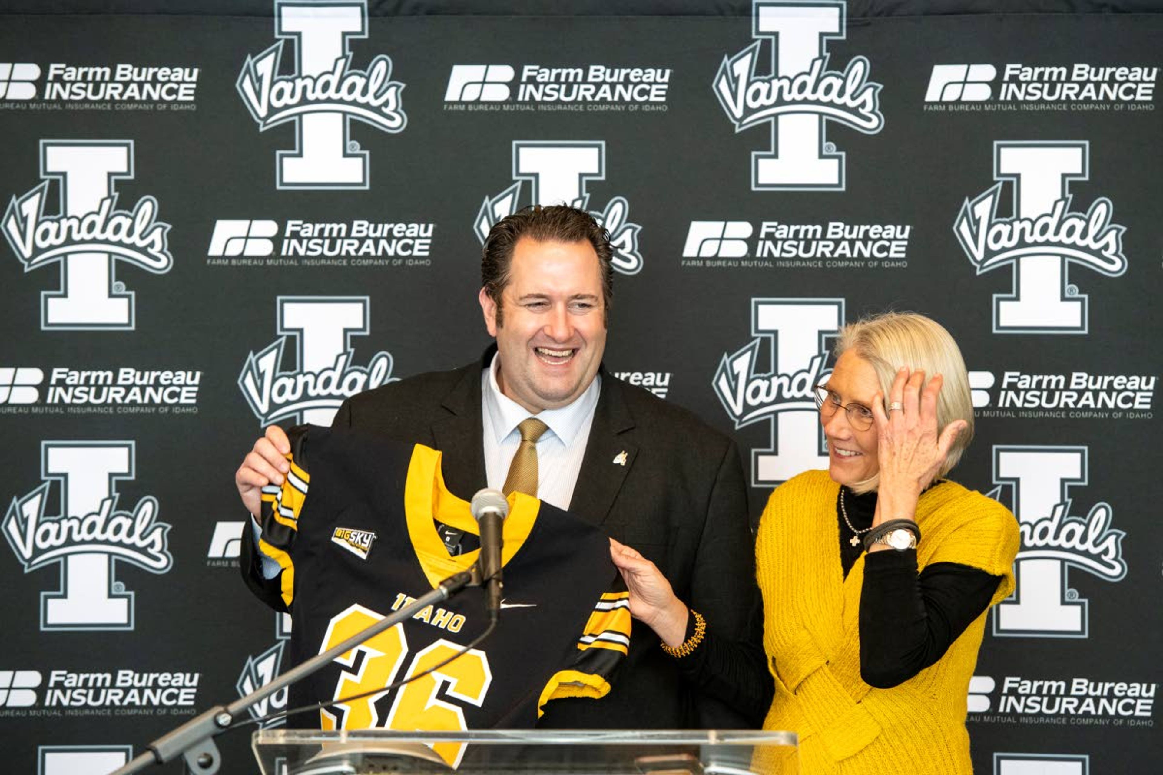 University of Idaho’s new football coach Jason Eck is introduced by Idaho athletic director Terry Gawlik during an introductory news conference Dec. 21 at Idaho Central Credit Union Arena. Eck will be Idaho’s 36th head coach.