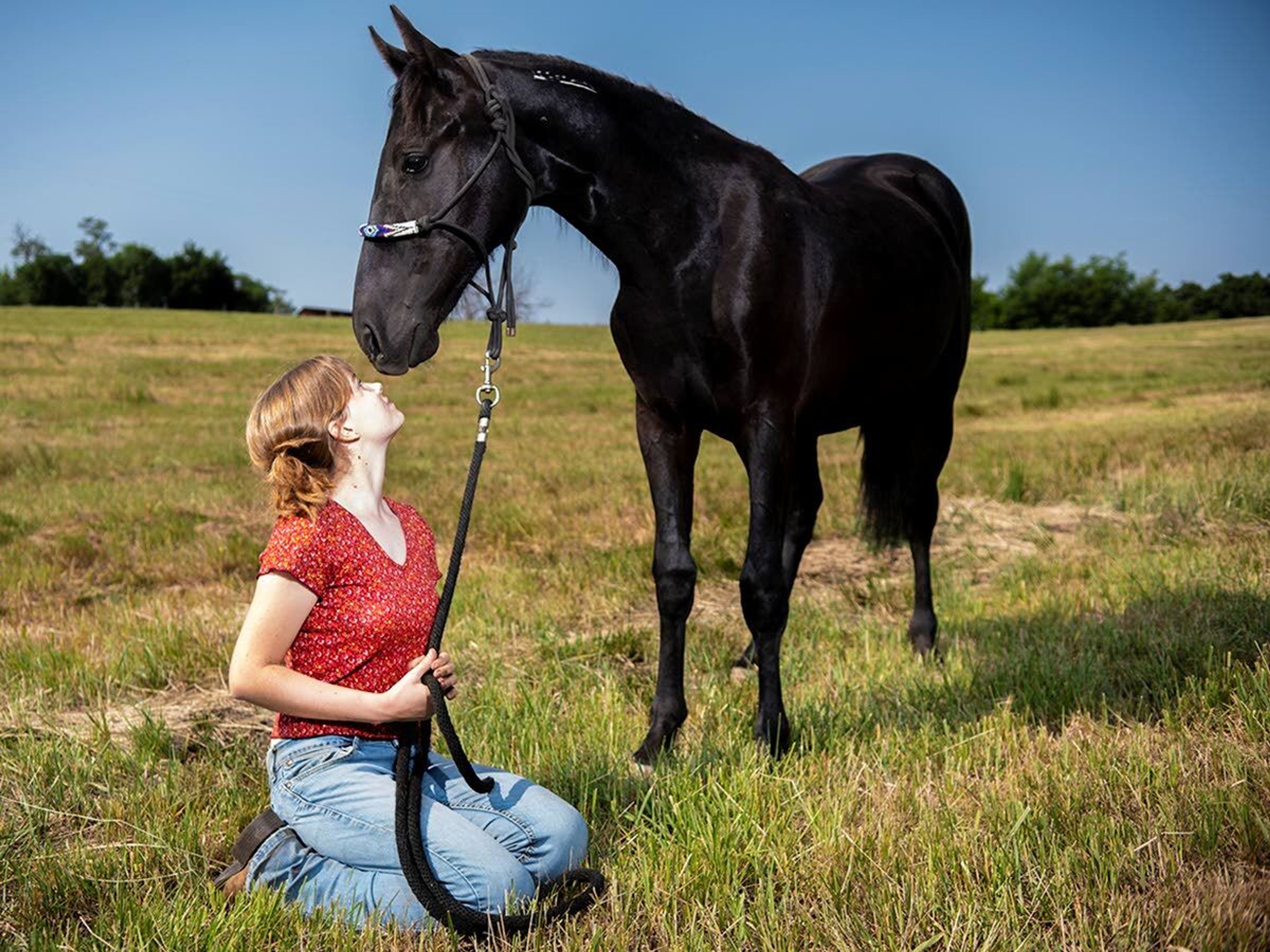 Hylton poses for a picture with her mustang, Lyra, outside of the family barn in Moscow. In the coming years, Hylton hopes to pursue a four-year-degree in natural horsemanship at the University of Montana Western in Dillon.