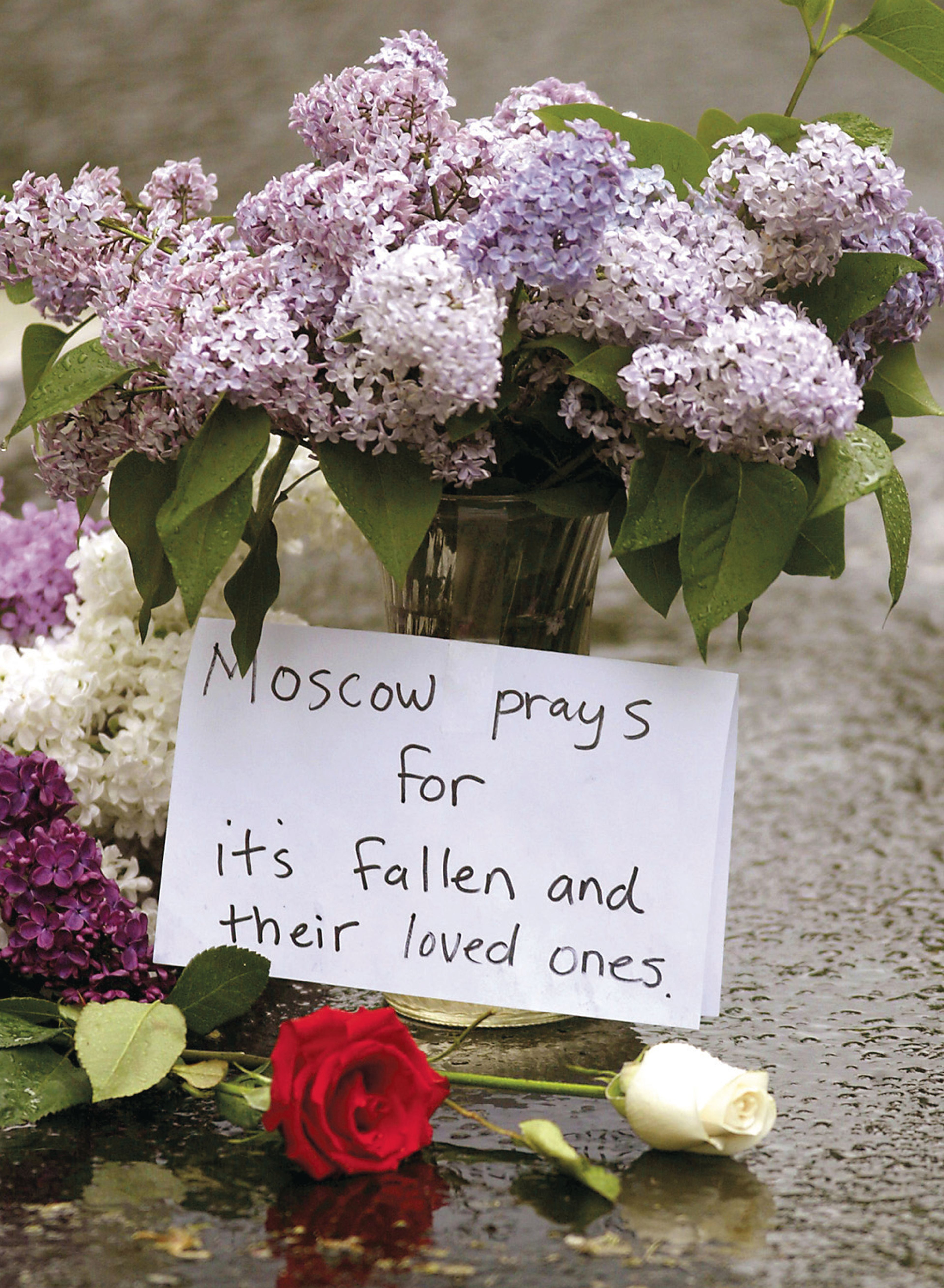 Flowers are left on Van Buren Street near the First Presbyterian Church in Moscow on Sunday, May 20, 2007.