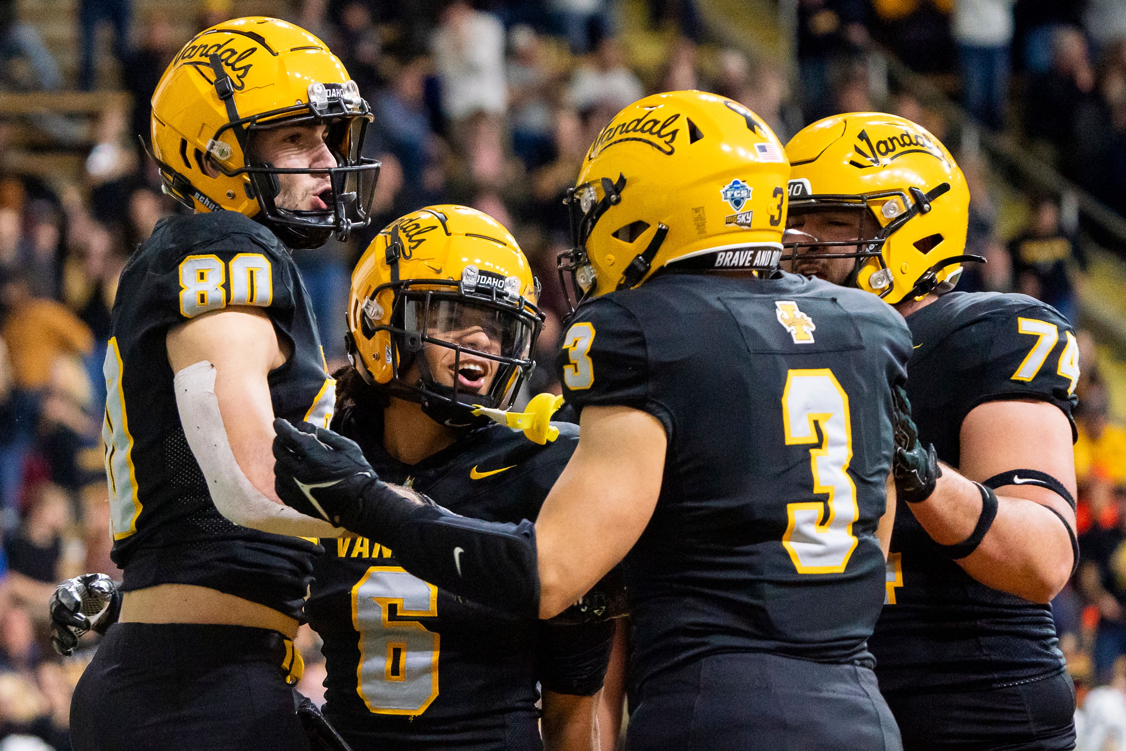 Idaho Vandals wide receiver Hayden Hatten (80) celebrates with teammates after scoring a touchdown during a Nov. 18 game at the Kibbie Dome in Moscow.