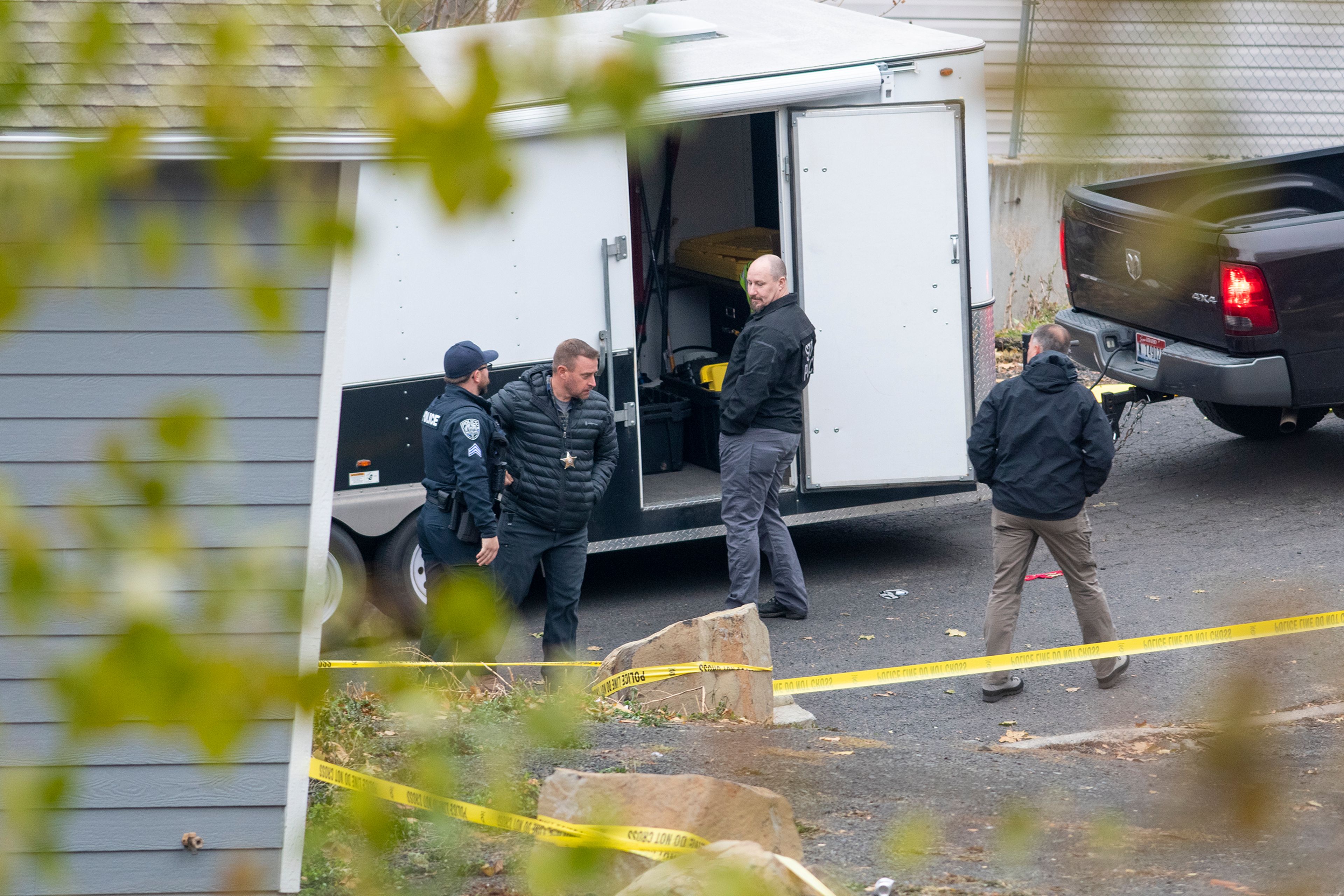 Officers investigate a homicide at an apartment complex south of the University of Idaho campus.