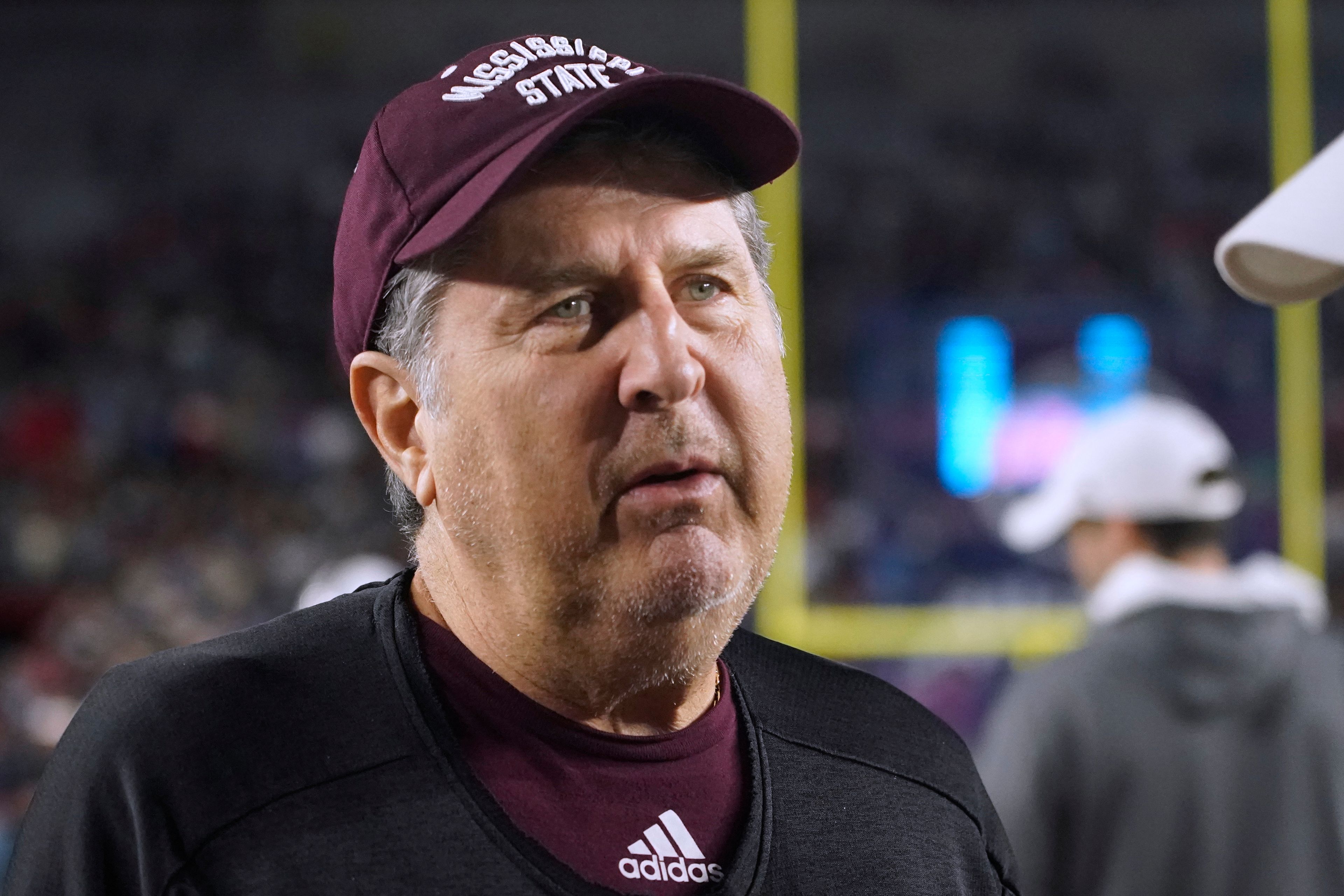 Mississippi State coach Mike Leach talks with Mississippi coach Lane Kiffin before an NCAA college football game in Oxford, Miss., Thursday, Nov. 24, 2022. (AP Photo/Rogelio V. Solis)