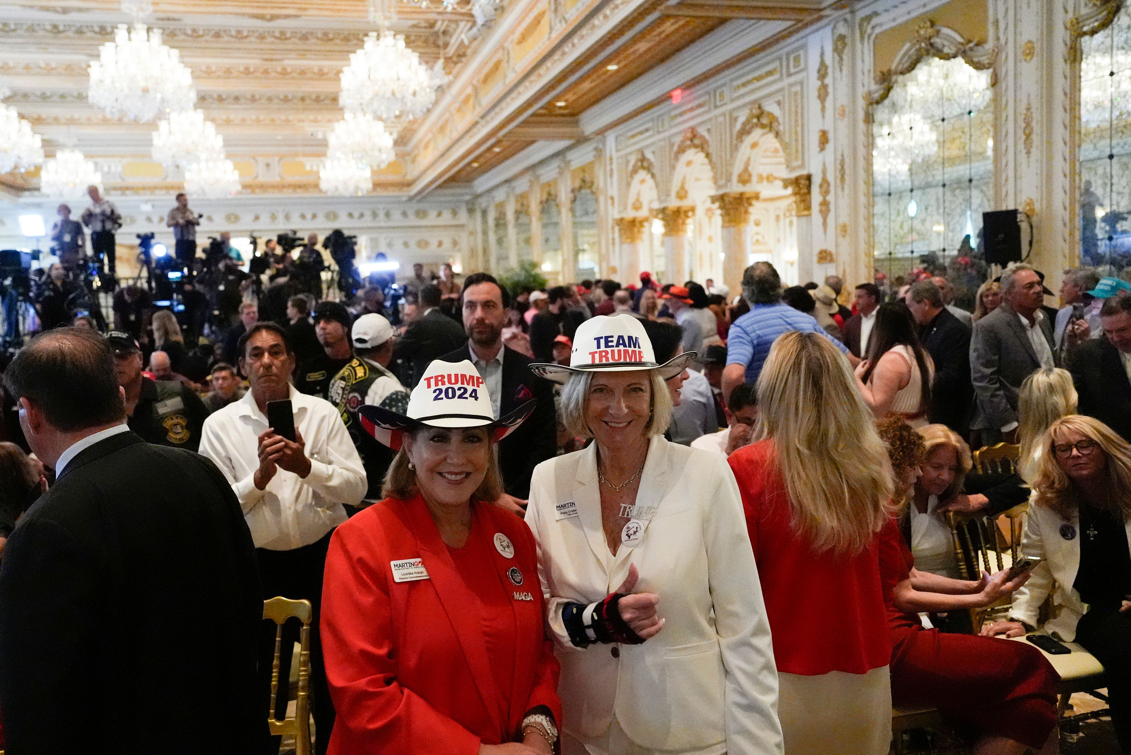 Supporters arrive before Republican presidential nominee former President Donald Trump speaks during a news conference at his Mar-a-Lago estate, Tuesday, Oct. 29, 2024, in Palm Beach, Fla. (AP Photo/Julia Demaree Nikhinson)