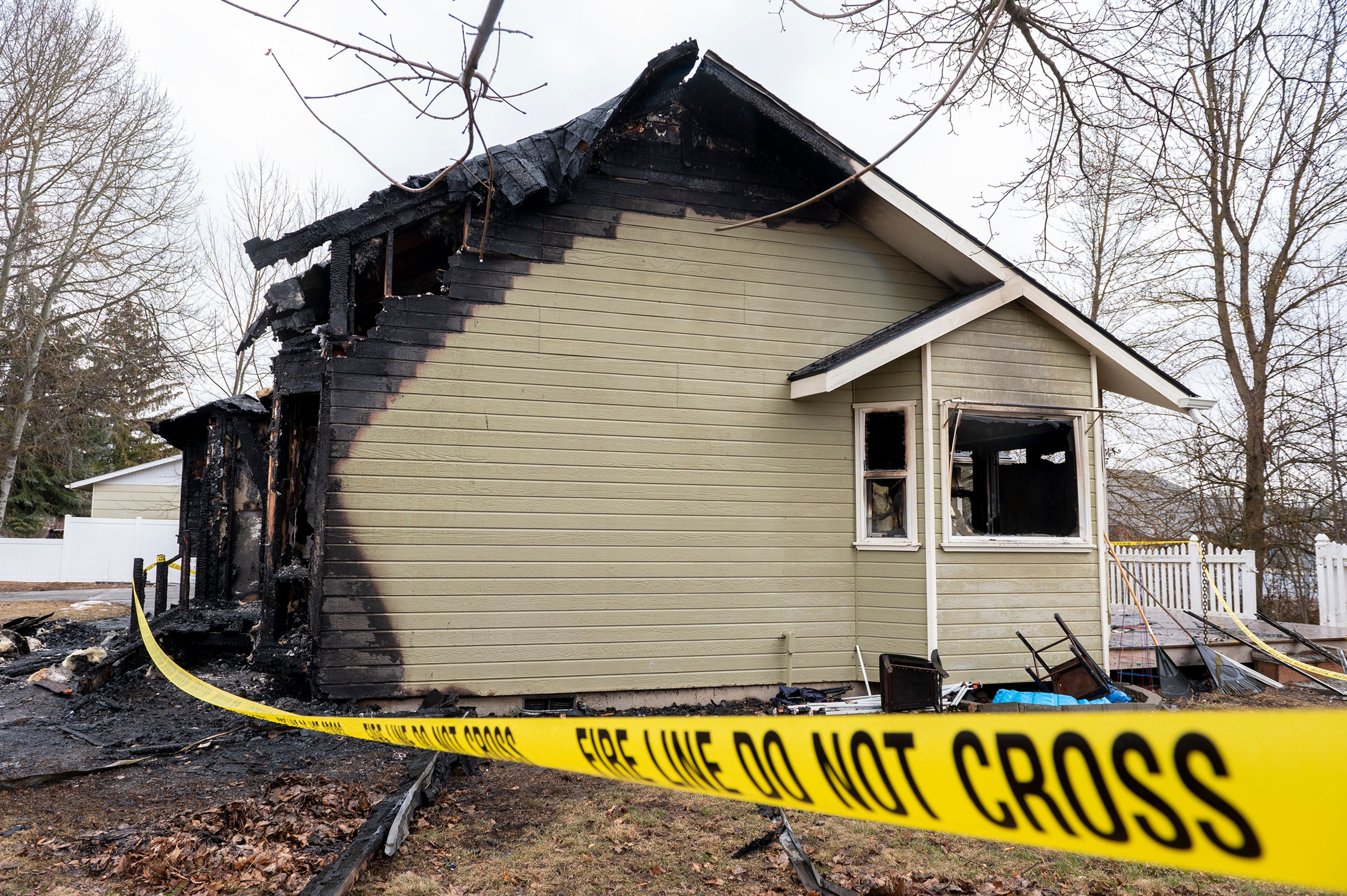 Fire line barricade tape surrounds the Oxford House on Monday in Moscow after a fire damaged the building early Sunday morning.