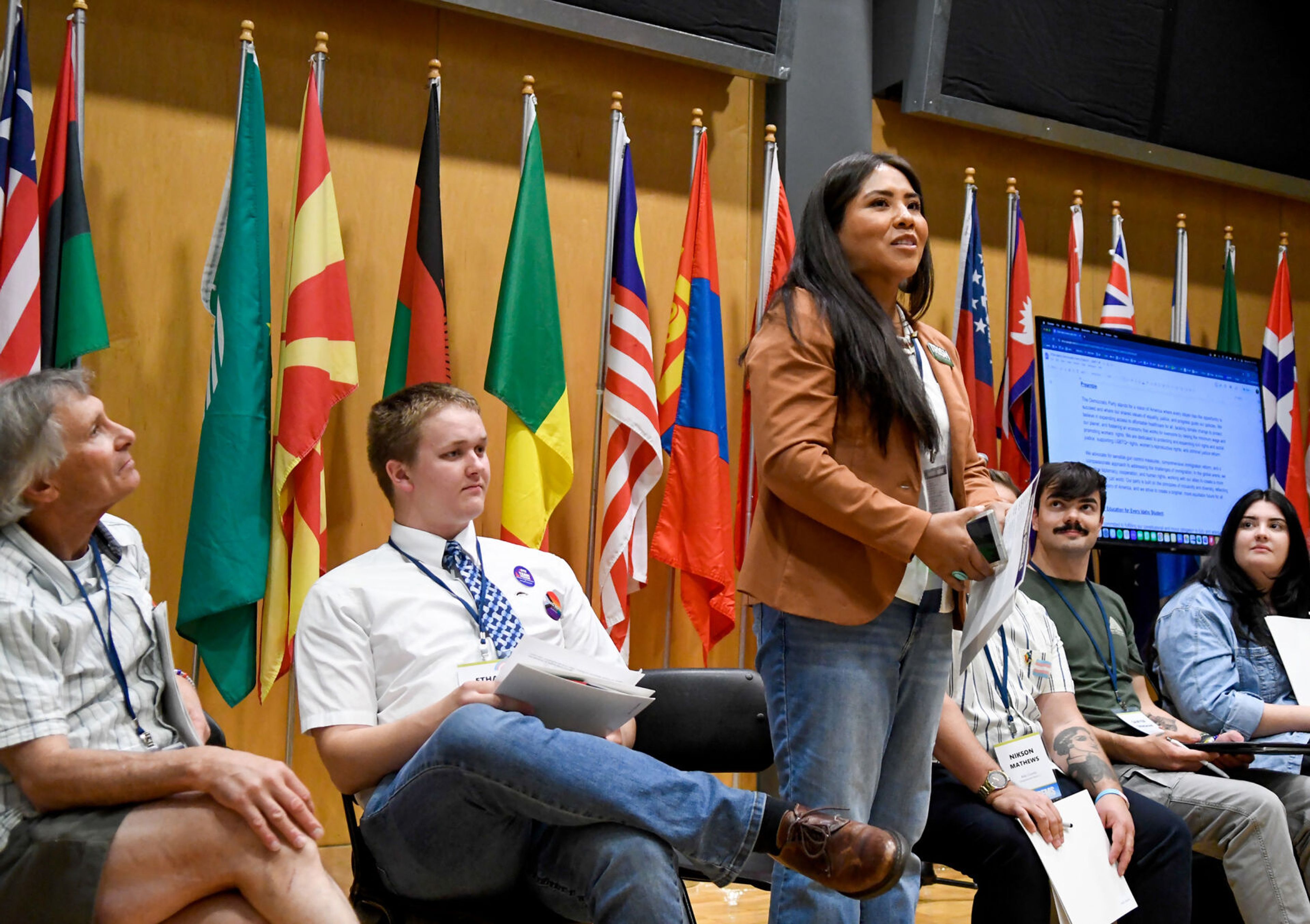 Trish Carter-Goodheart, of Lapwai, stands during introductions to the platform committee at the Idaho Democratic Convention in Moscow in June. The committee shared the current platform and received feedback from the audience for their next draft.