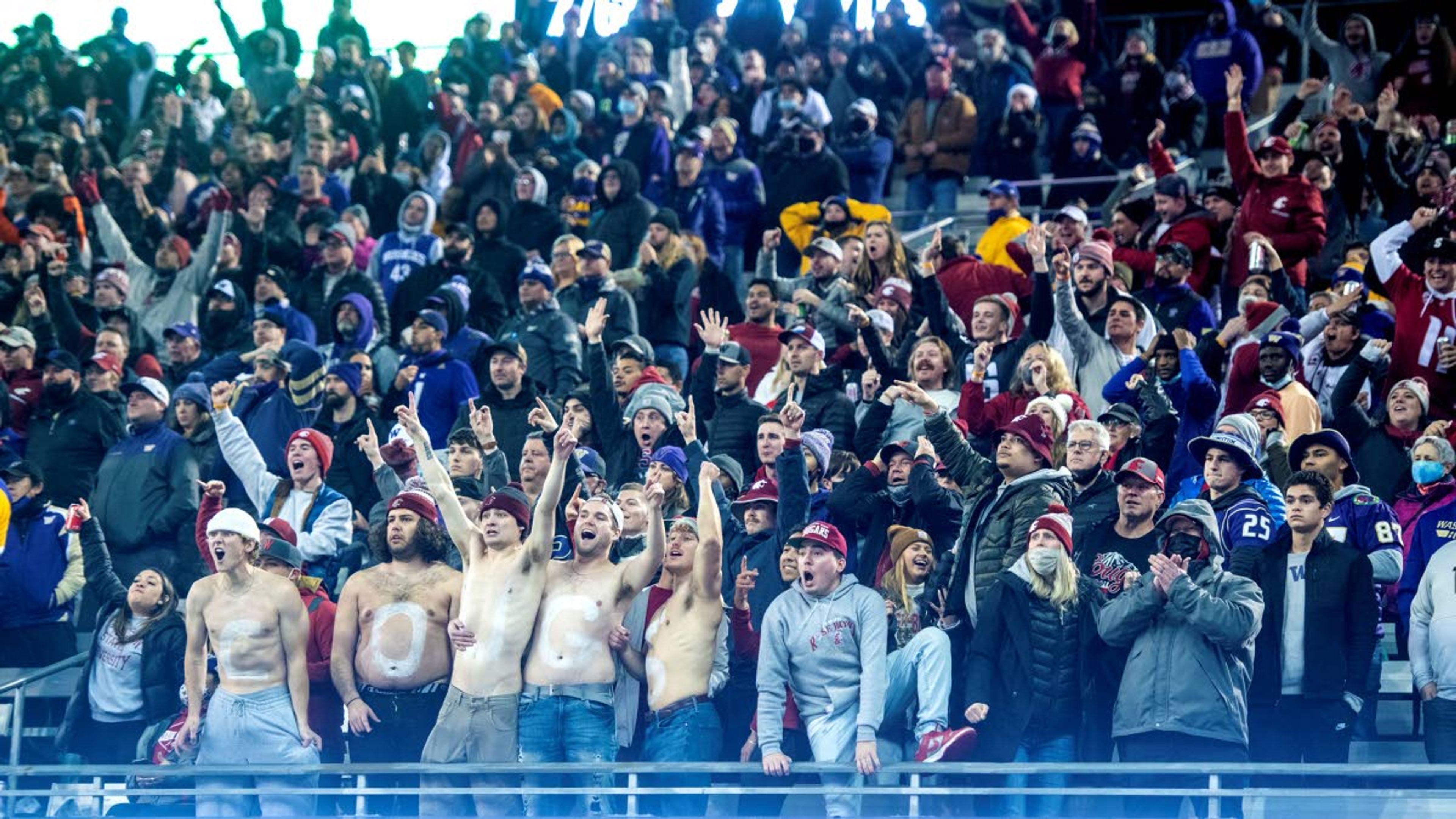 Washington State Cougar fans react to a third quarter interception by Washington State Cougars defensive back Armani Marsh during the Apple Cup on Friday night at Husky Stadium in Seattle. The Cougars defeated the Huskies 40-13. Read more on Page 7A.