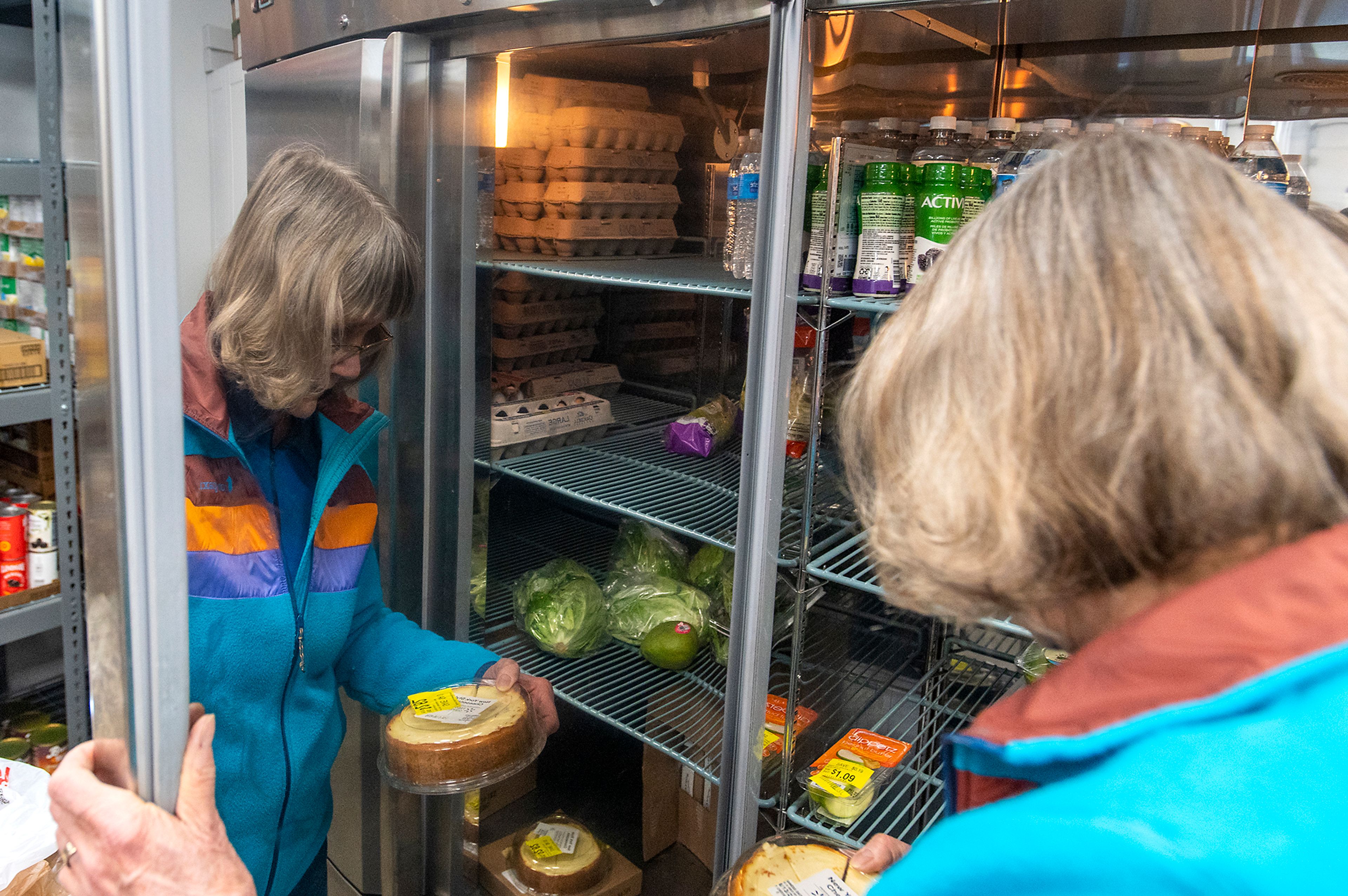 Moscow Food Bank director Linda Nickels checks inventory on Thursday afternoon.