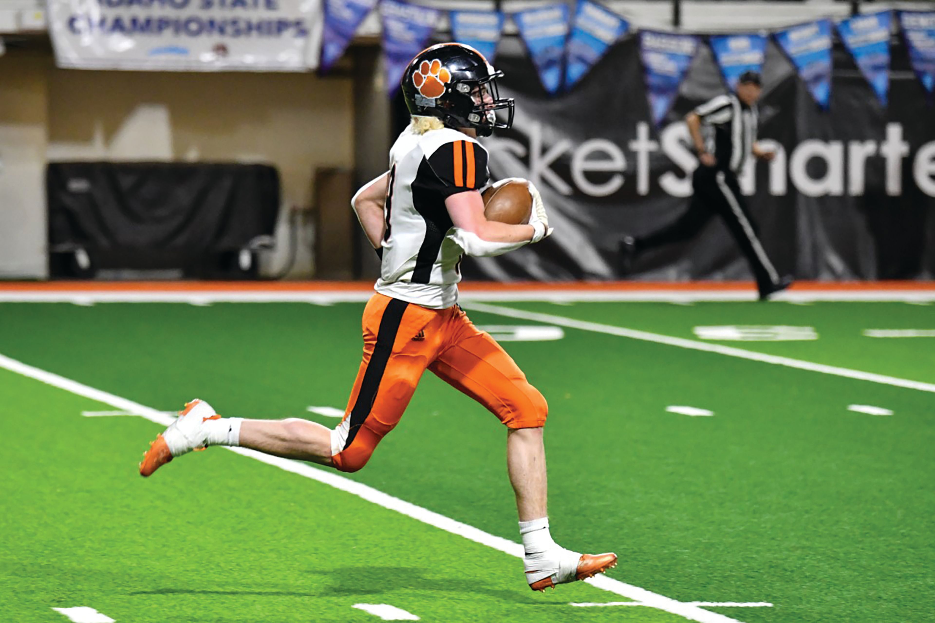 Scott Kirtley/For The Tribune Kendrick sophomore Sawyer Hewett runs in for a touchdown during Friday's Idaho Class 1A Division II football state championship game against Dietrich at Holt Arena in Pocatello.