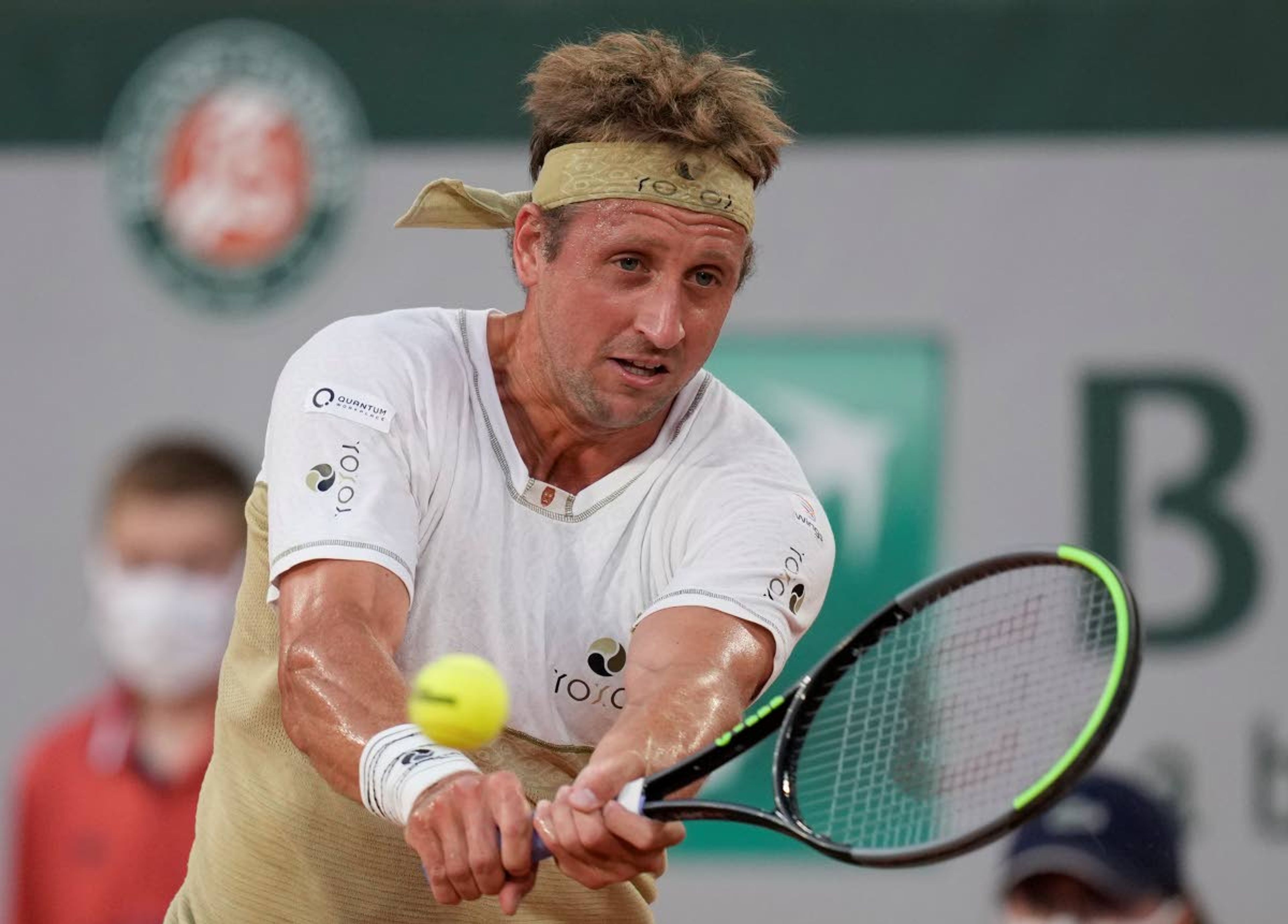 United States's Tennys Sandgren plays a return to Serbia's Novak Djokovic during their first round match on day three of the French Open tennis tournament at Roland Garros in Paris, France, Tuesday, June 1, 2021. (AP Photo/Christophe Ena)