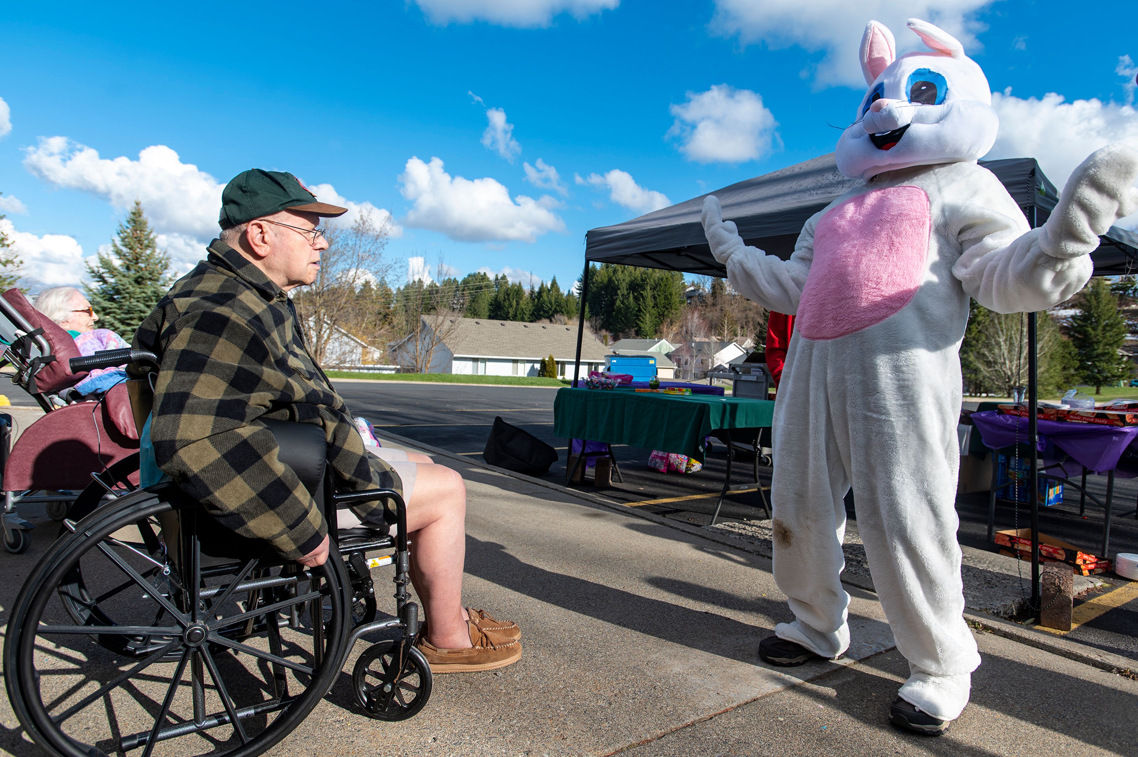 Zipper T. Bunny interacts with residents during the annual Easter egg hunt at Aspen Park of Cascadia on Friday afternoon in Moscow.