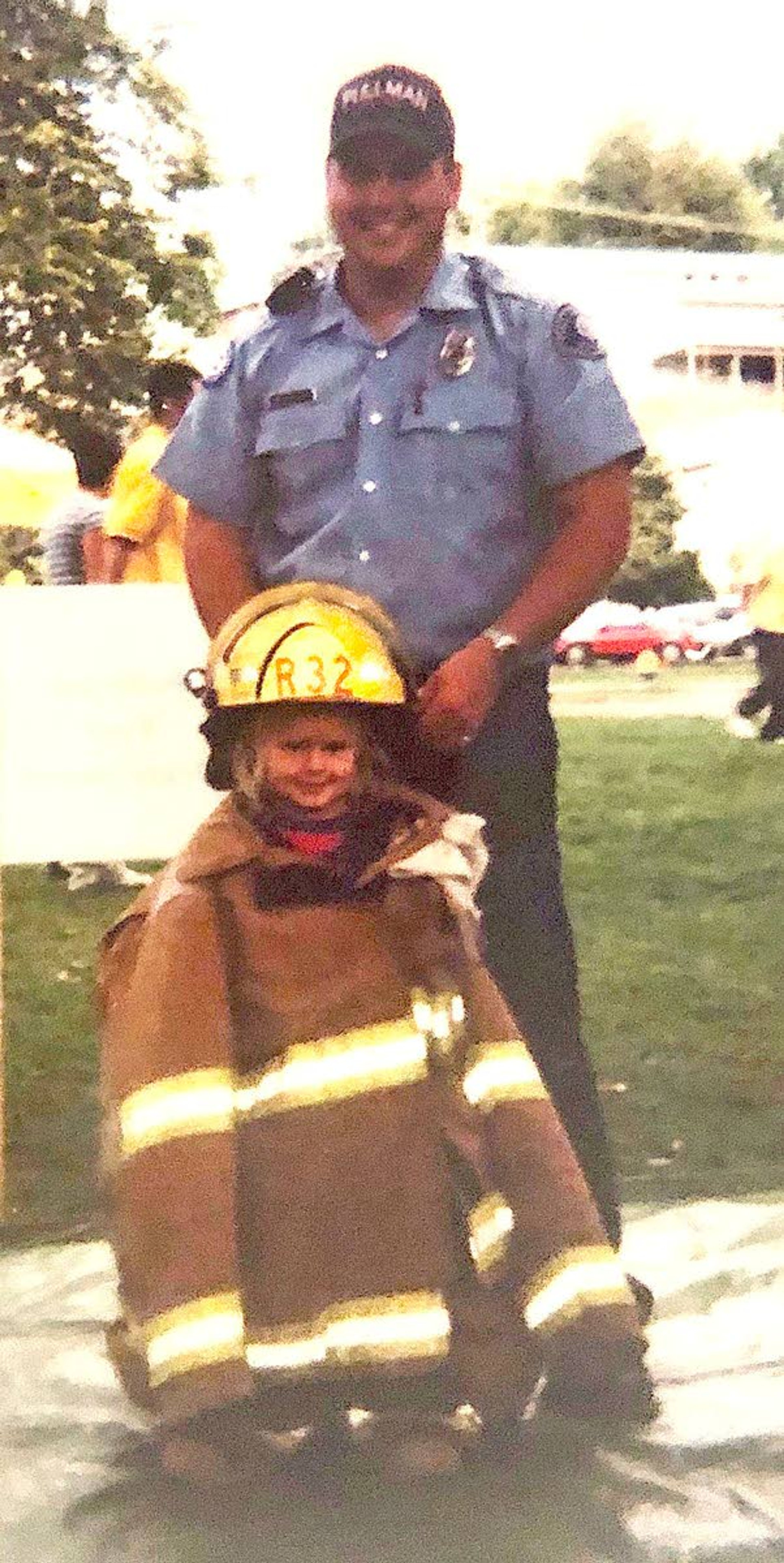 Crystal Hillestad and John Gollnick pose together in 2003 at the National Lentil Festival in Pullman. Gollnick and Hillestad now work together as firefighters at the Pullman Fire Department.