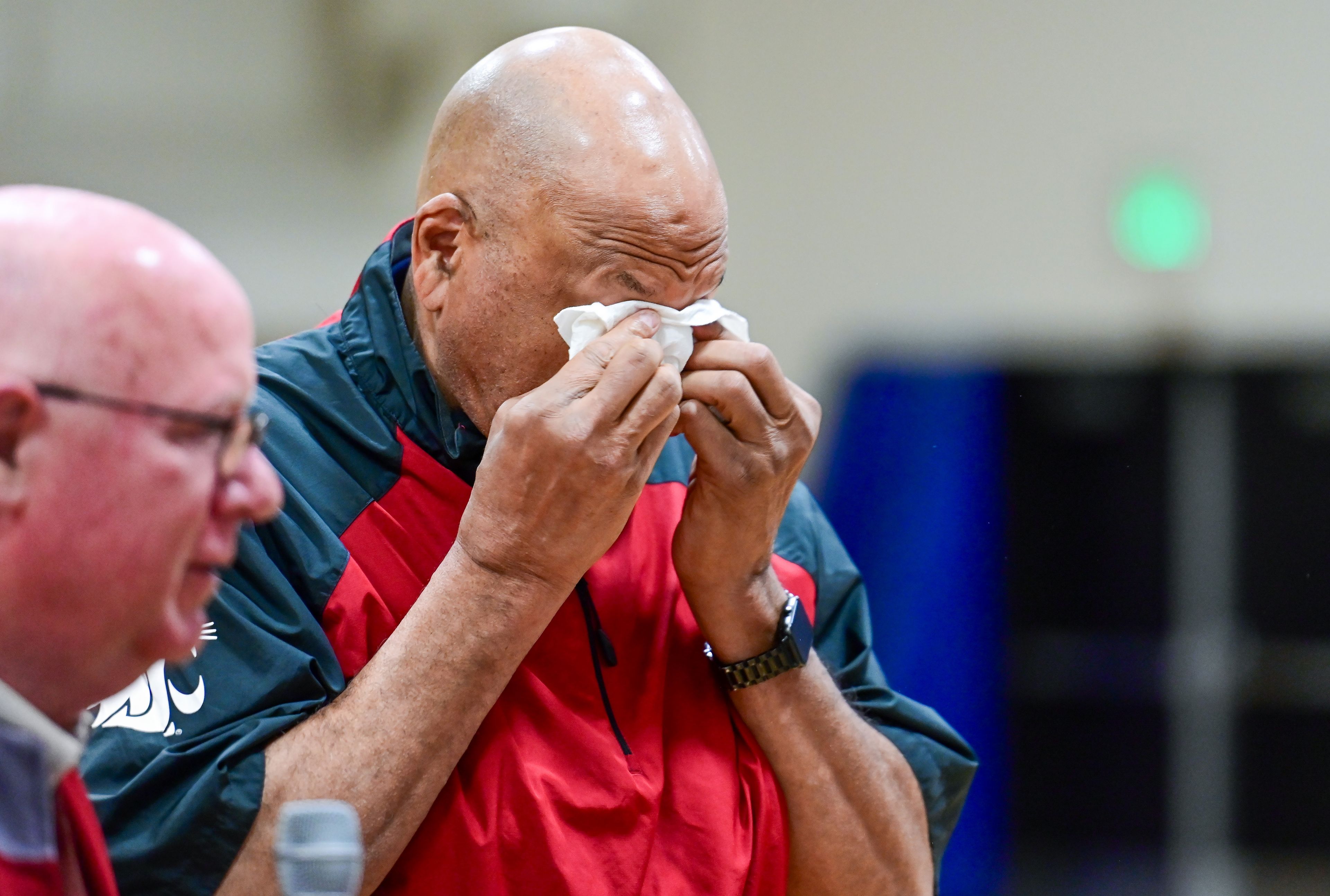 Former NBA and WSU athlete James Donaldson wipes tears from his eyes after speaking with Colton High School students about mental health on Tuesday.